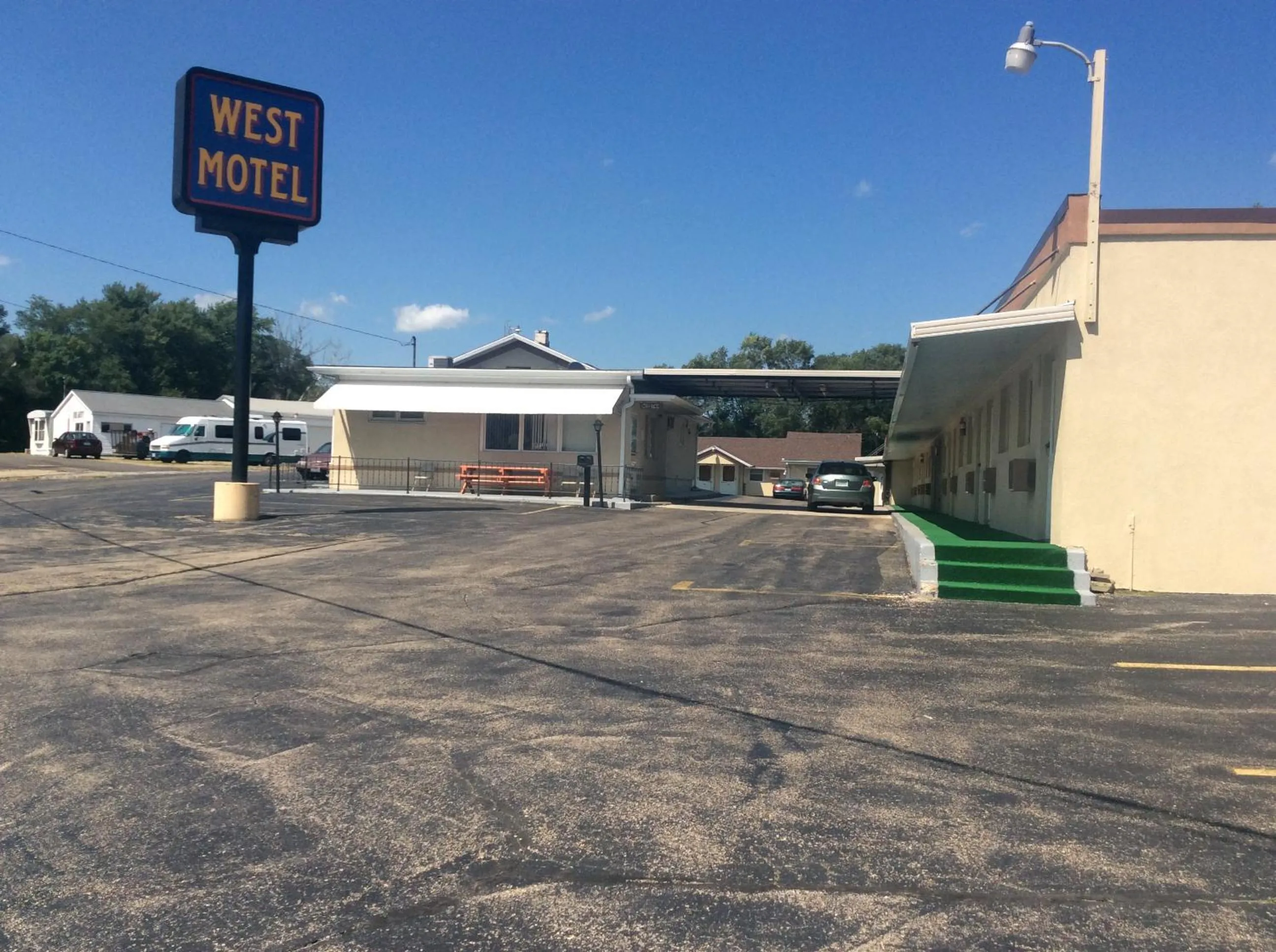 Property logo or sign in West Motel