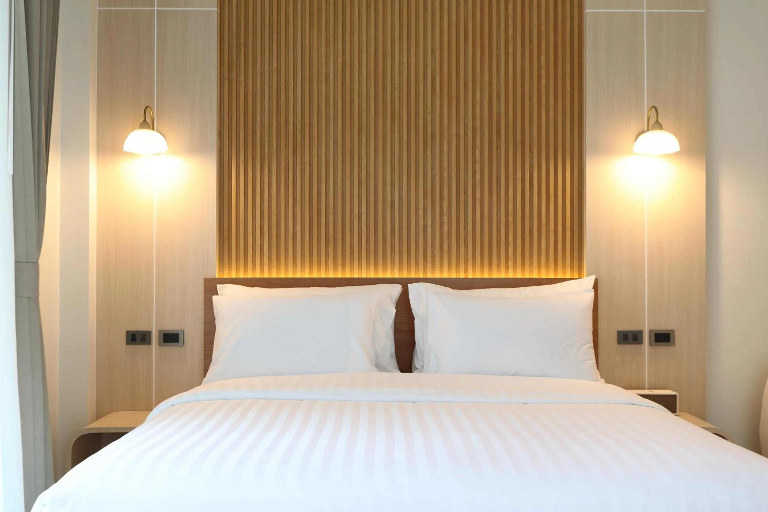 Bed in The Malika Hotel - SHA Extra Plus