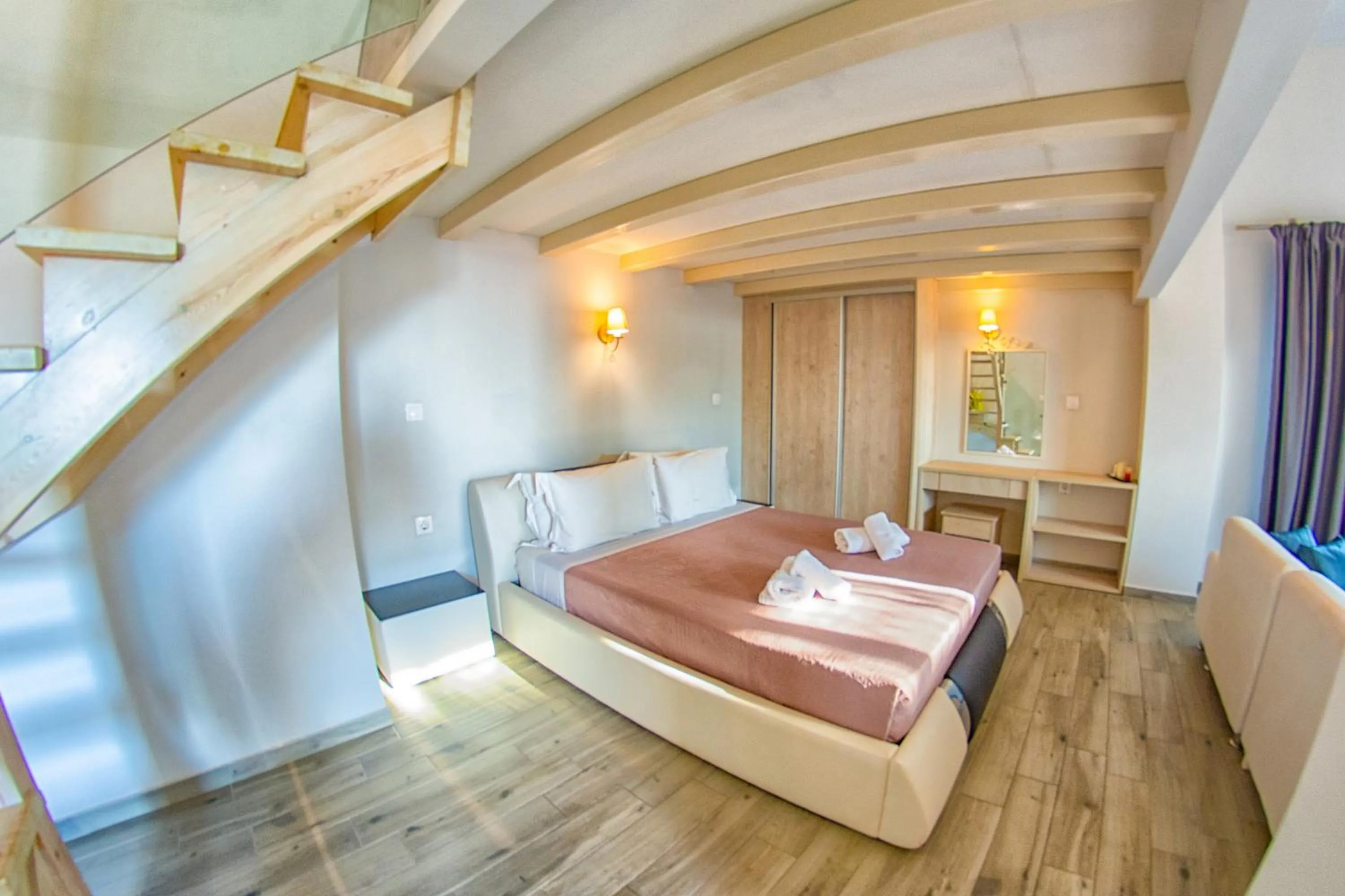 Bed in Tereza's Sunset Hotel