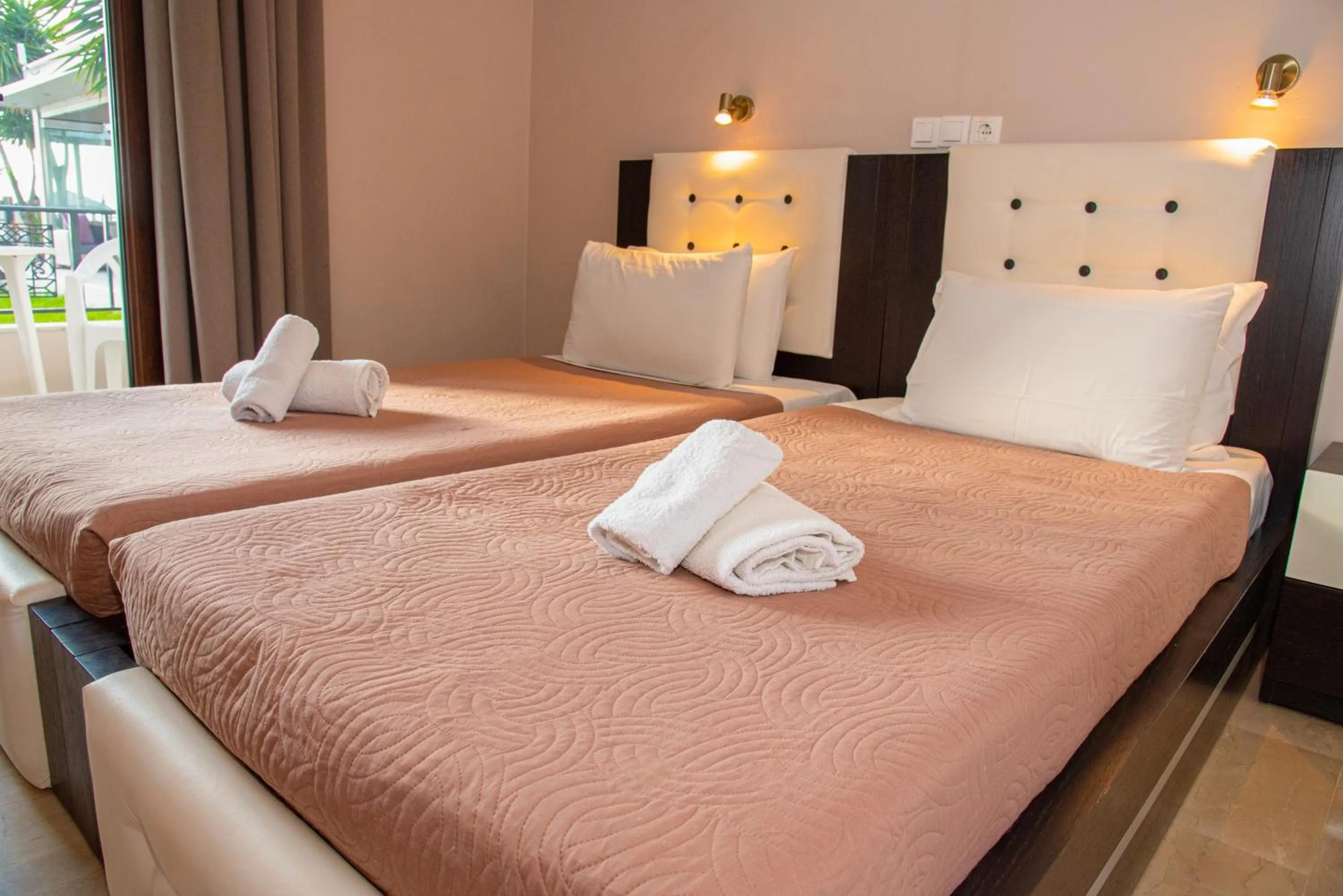 Bed in Tereza's Sunset Hotel