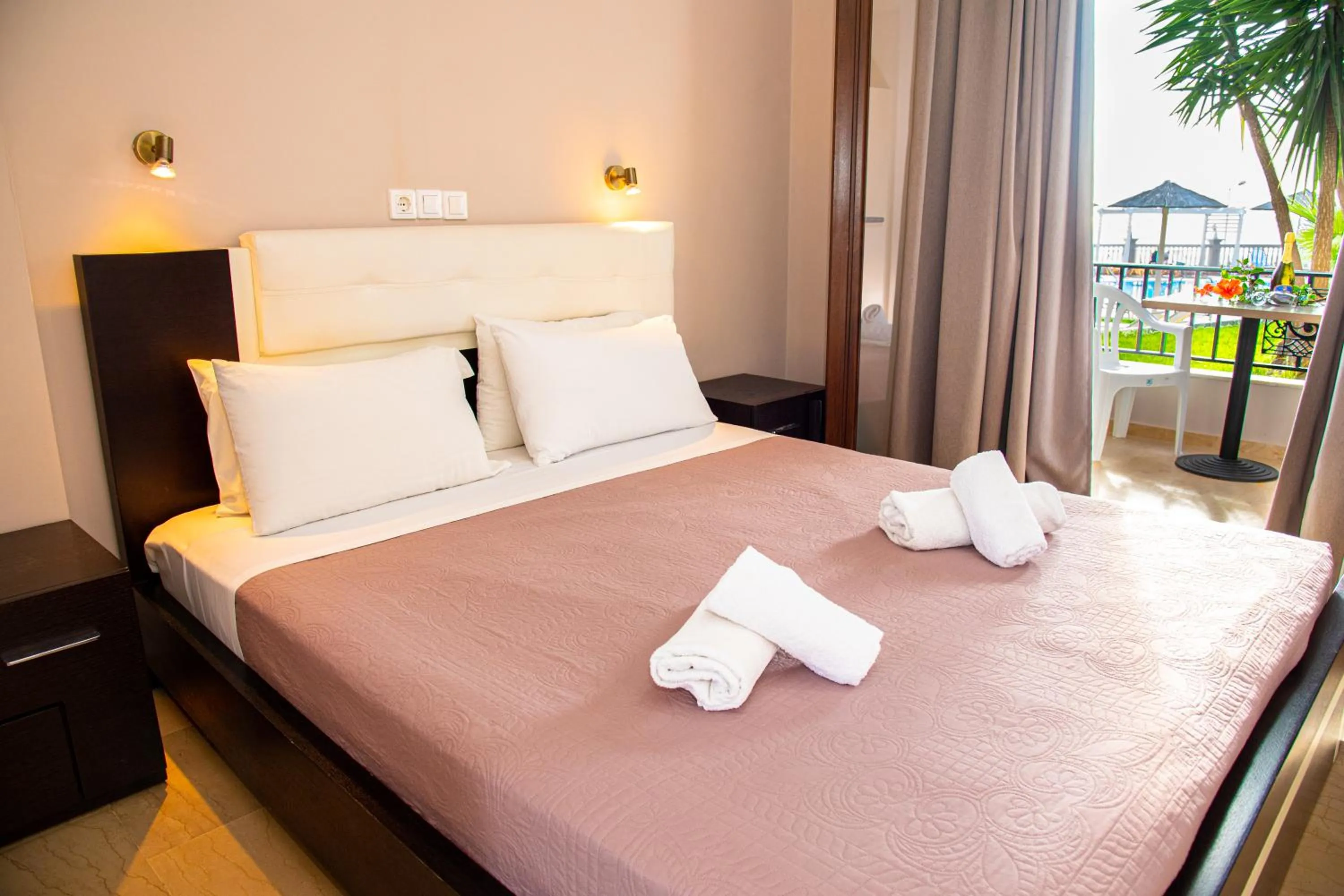 Bed in Tereza's Sunset Hotel