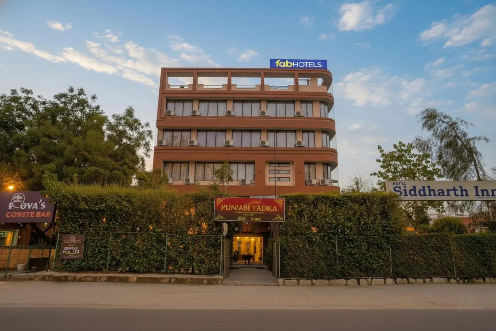 Property building in FabHotel Siddharth Inn - Nr Siddharth Bunglows Property building in FabHotel Siddharth Inn - Nr Siddharth Bunglows