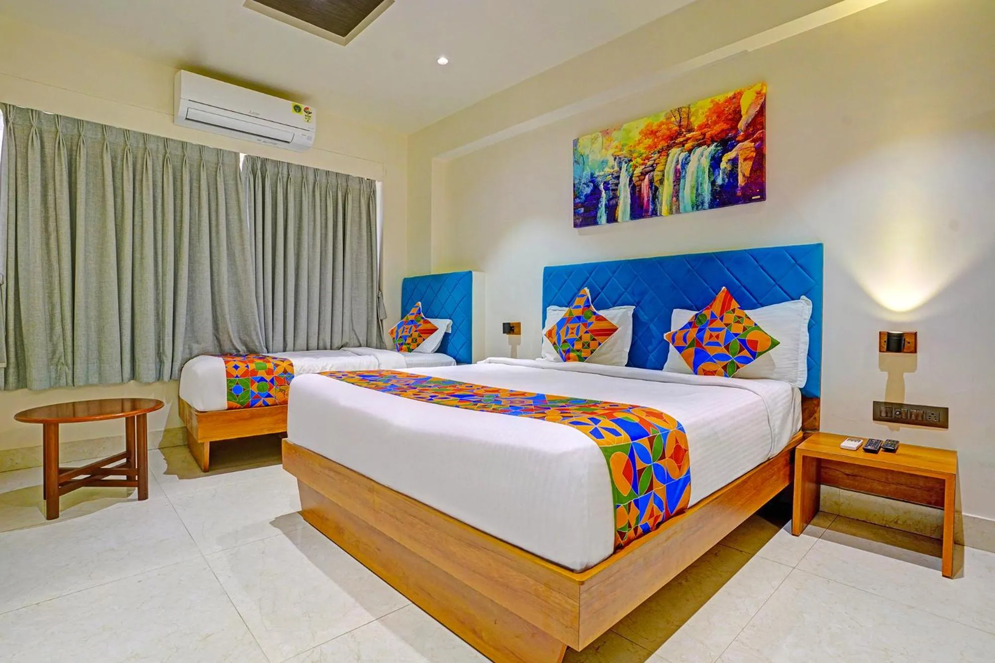 Bed in FabHotel Siddharth Inn - Nr Siddharth Bunglows