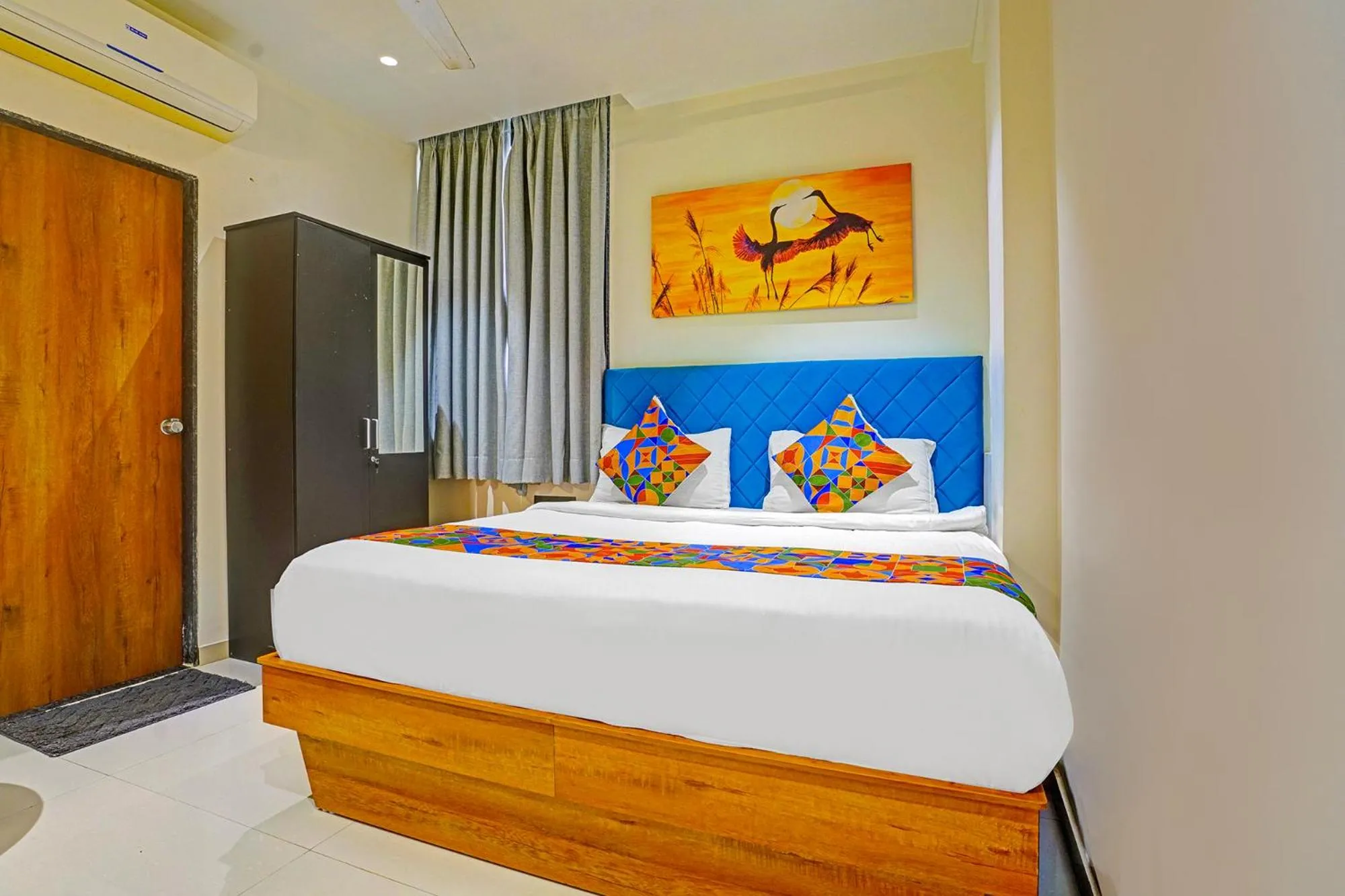 Bed in FabHotel Siddharth Inn - Nr Siddharth Bunglows