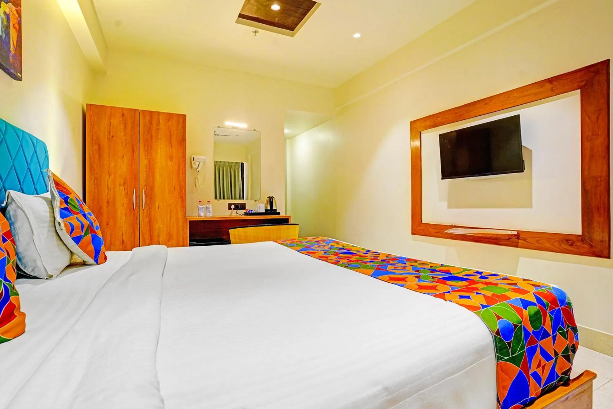 Bed in FabHotel Siddharth Inn - Nr Siddharth Bunglows