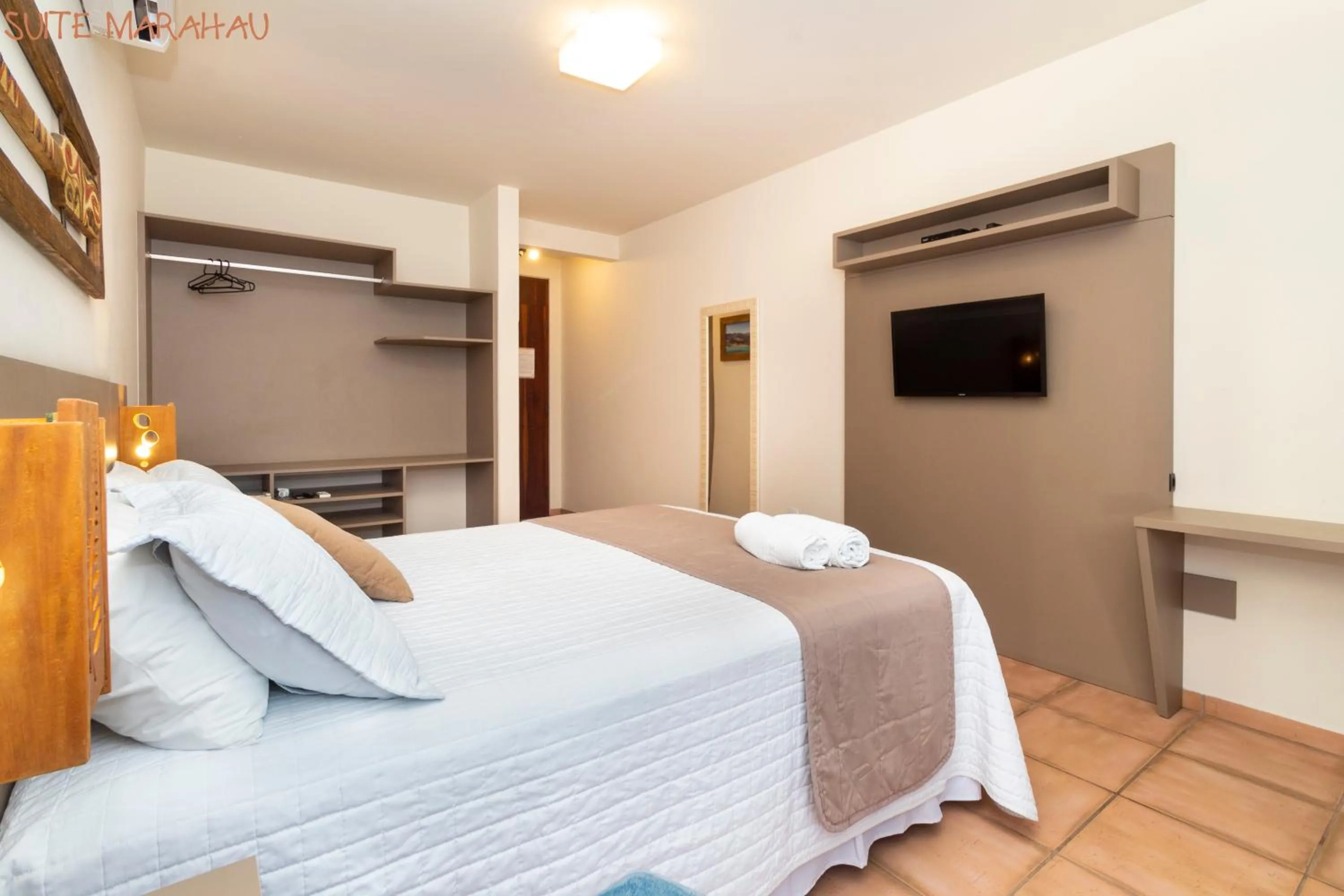 Bed in Pousada Kia Ora Bombinhas