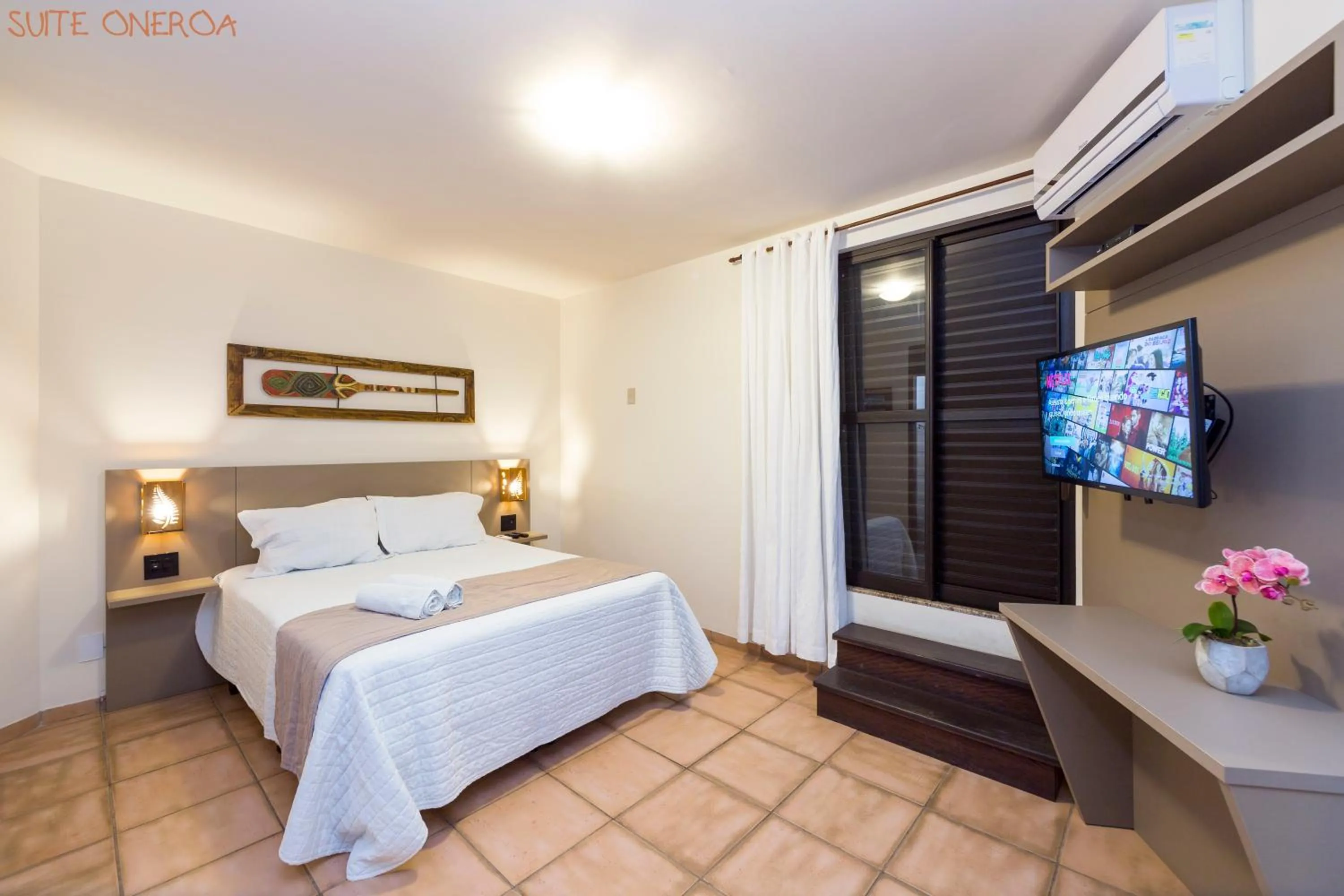 Bed in Pousada Kia Ora Bombinhas