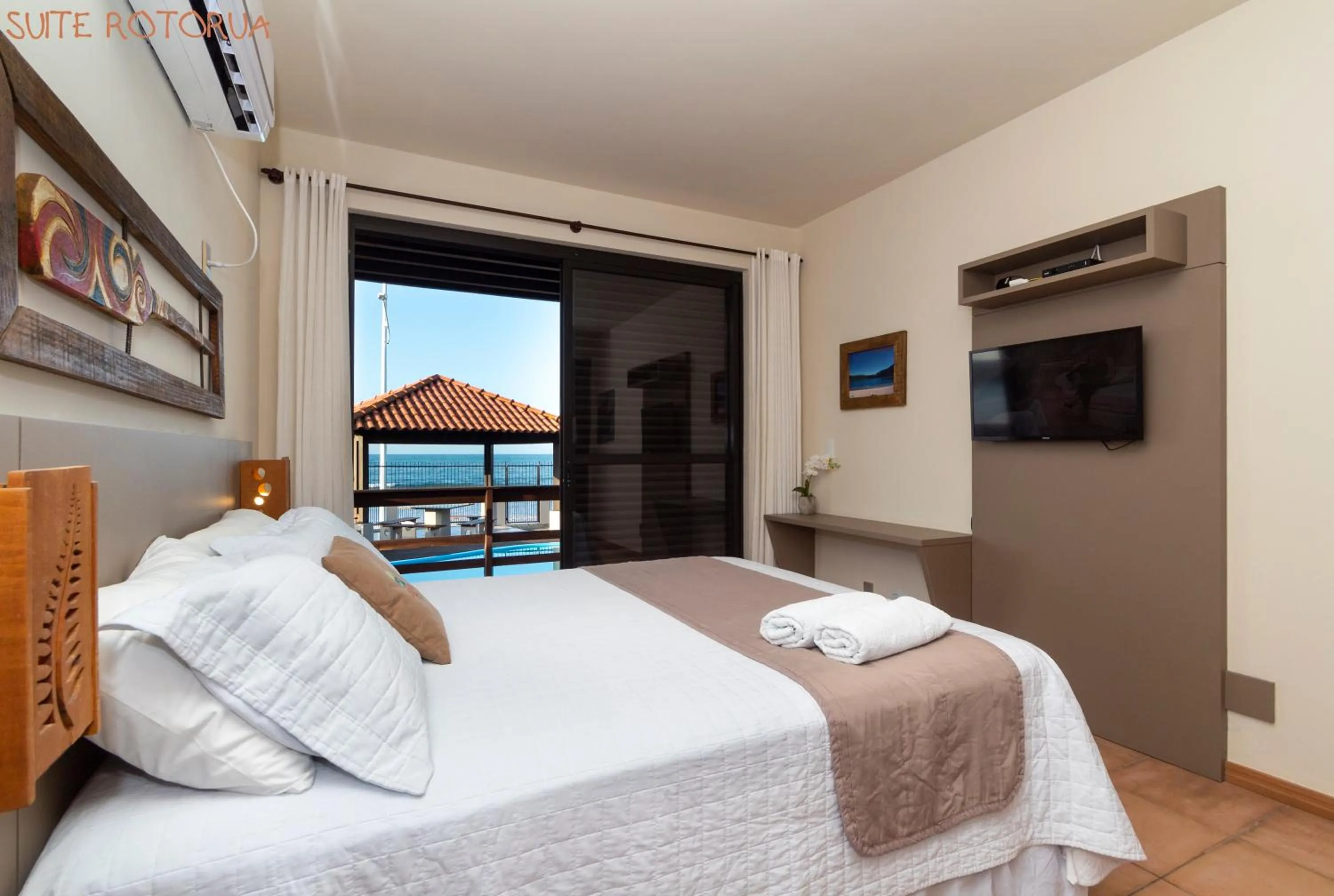 View (from property/room), Bed in Pousada Kia Ora Bombinhas