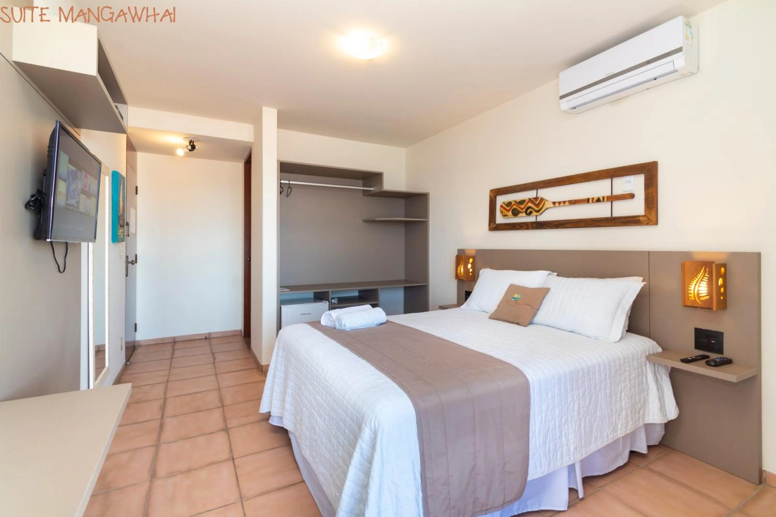 Bed in Pousada Kia Ora Bombinhas