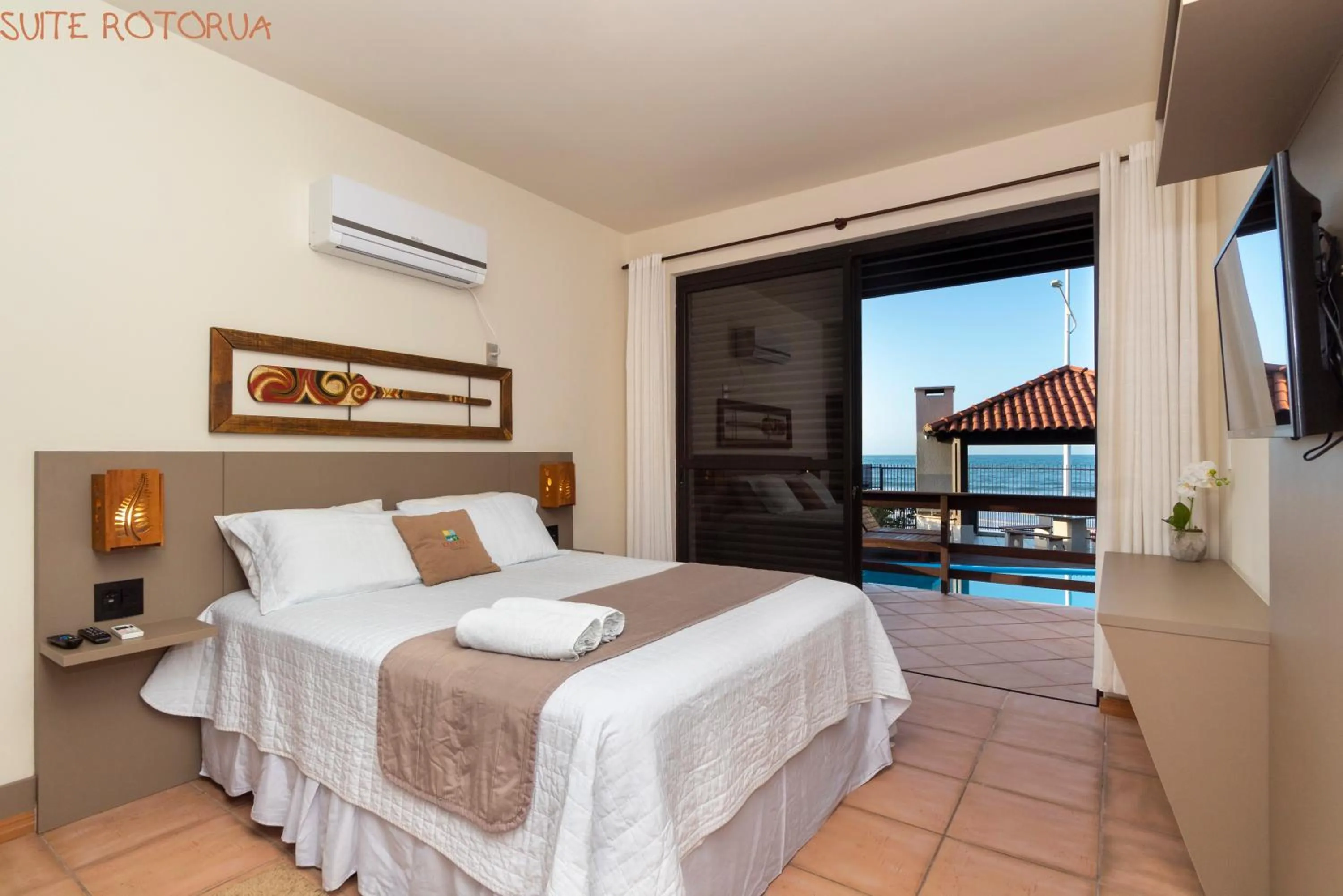 Bed in Pousada Kia Ora Bombinhas