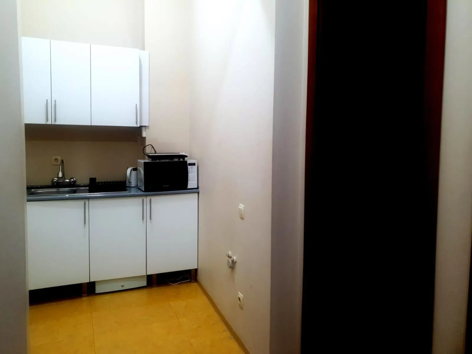 Kitchen or kitchenette in Daisi Sunset Hotel