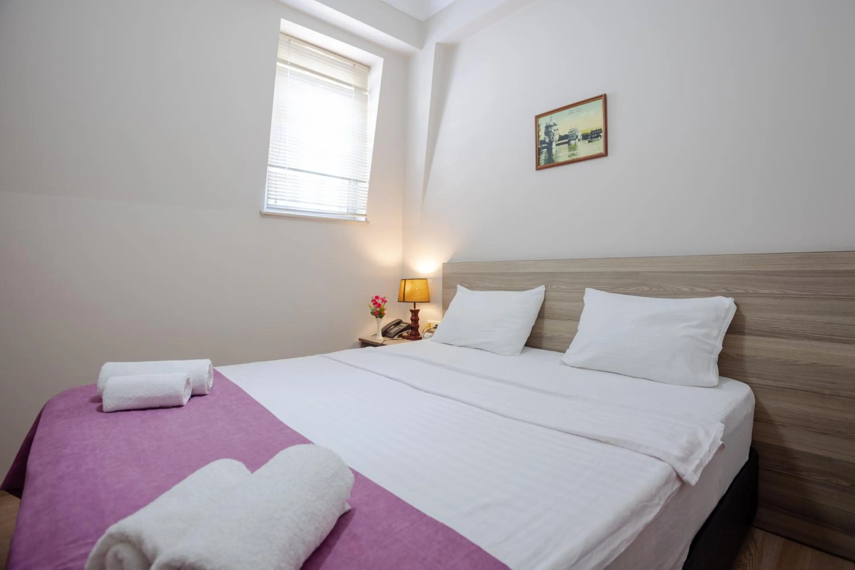 Bed in Daisi Sunset Hotel