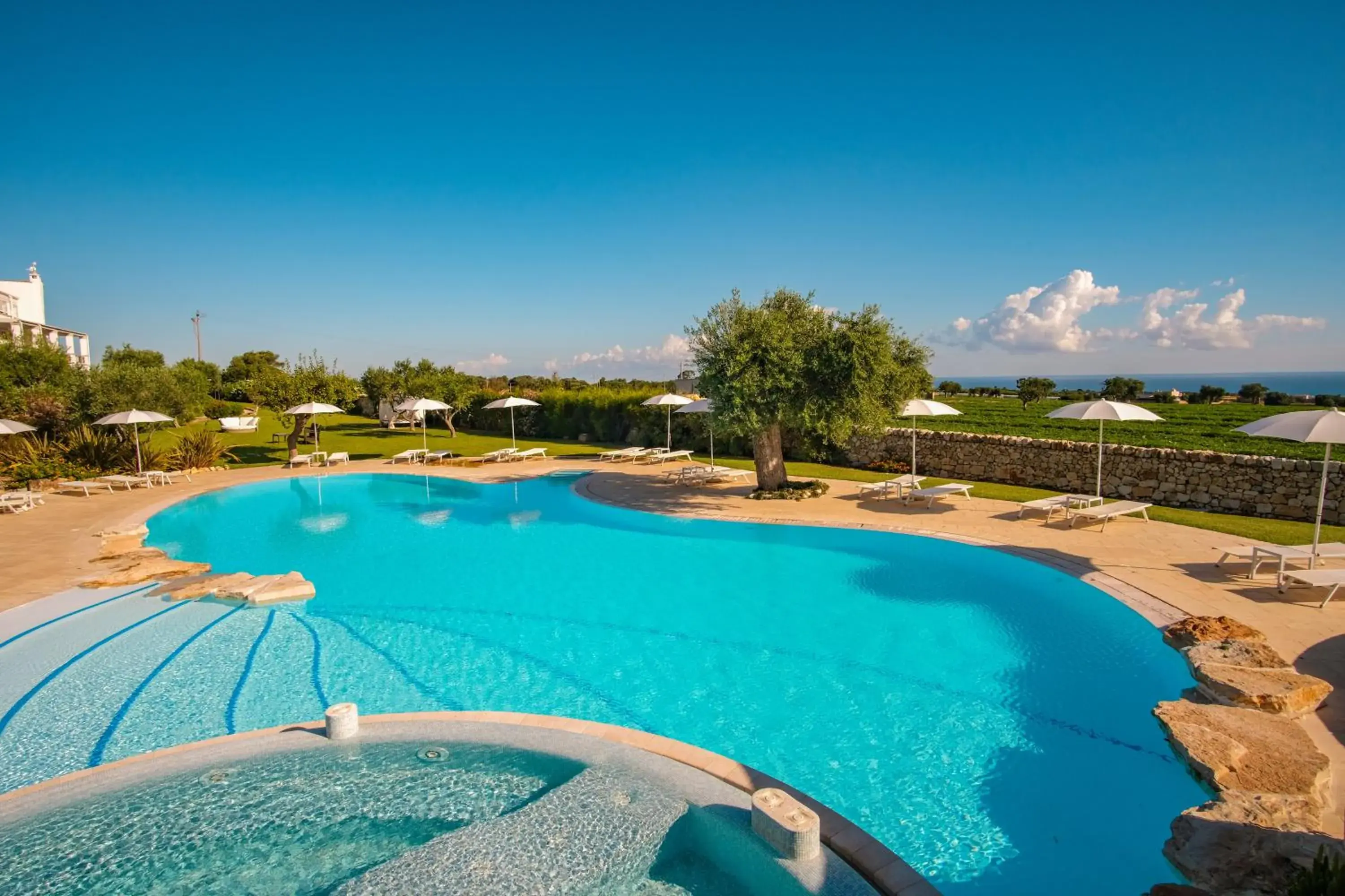 Swimming pool in Borgobianco Resort & Spa Polignano - MGallery Collection Swimming pool in Borgobianco Resort & Spa Polignano - MGallery Collection