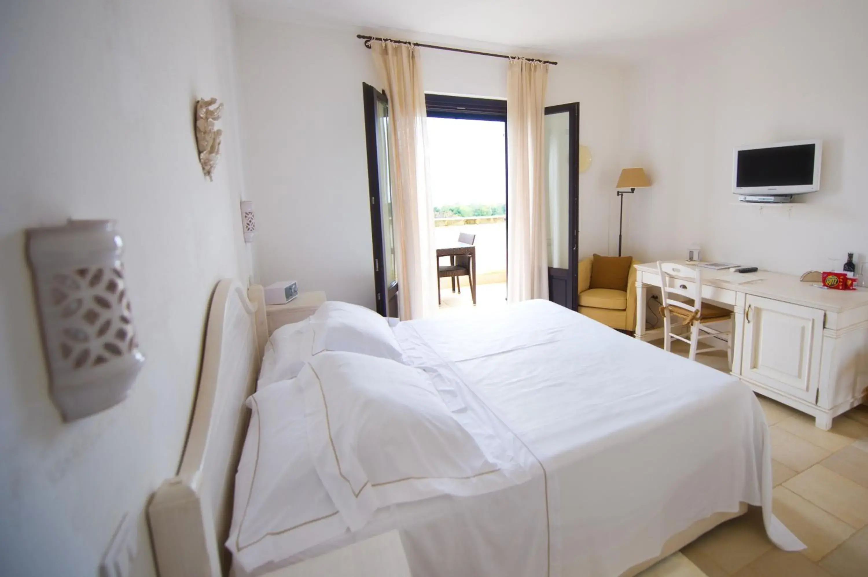 Photo of the whole room, Bed in Borgobianco Resort & Spa Polignano - MGallery Collection Photo of the whole room, Bed in Borgobianco Resort & Spa Polignano - MGallery Collection