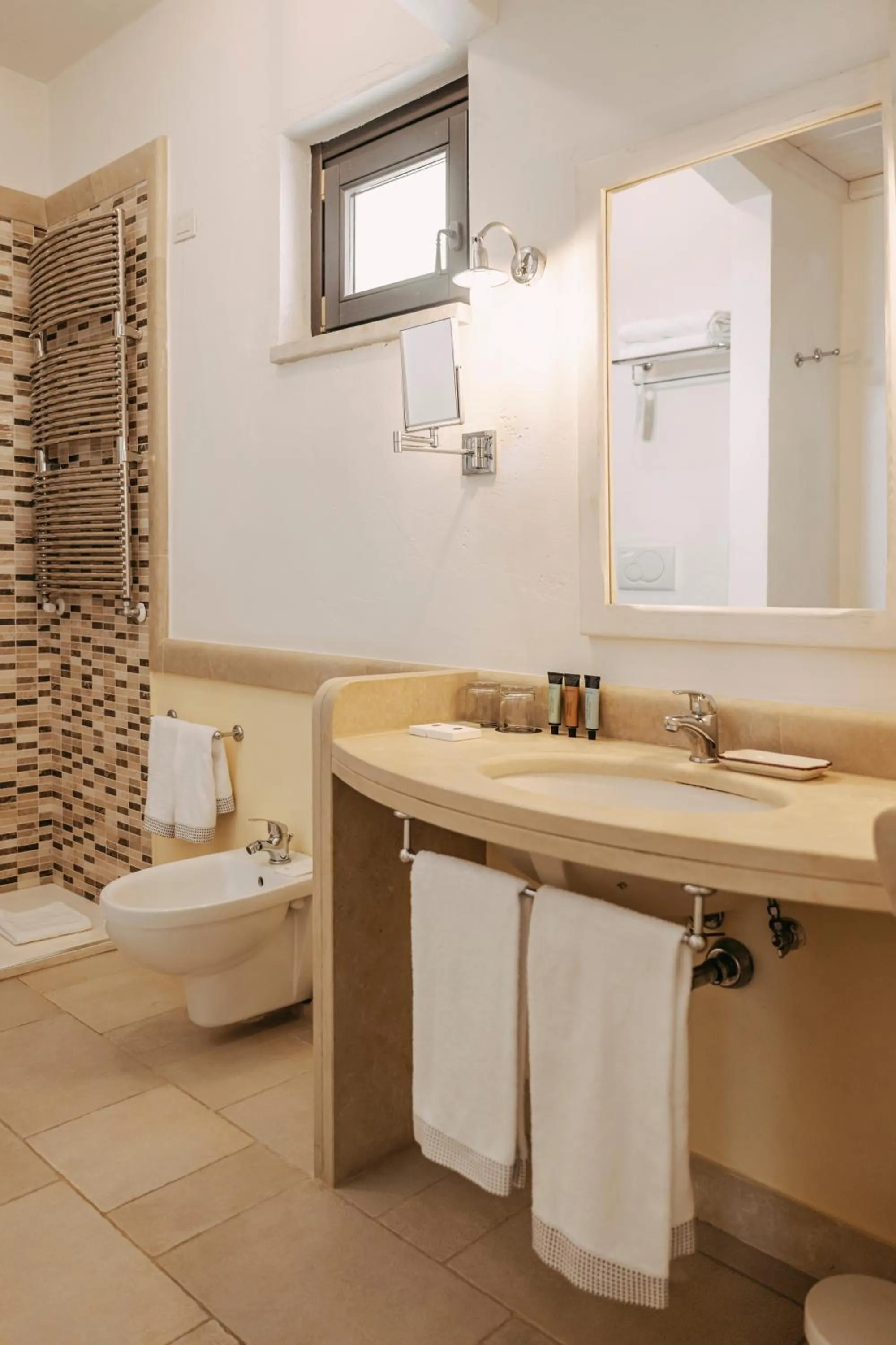 Bathroom in Borgobianco Resort & Spa Polignano - MGallery Collection