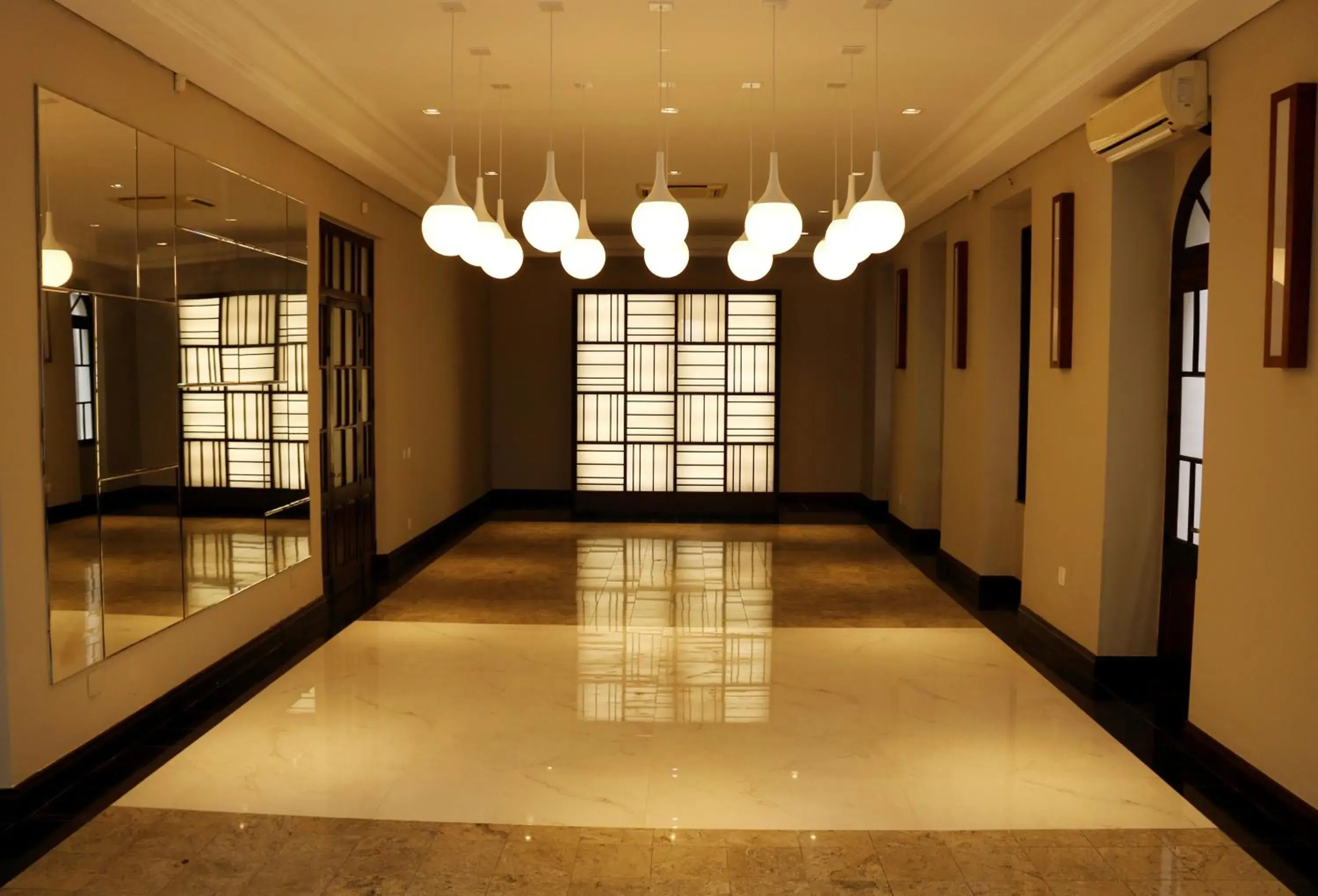 Living room in Johnscher by SJ - San Juan Curitiba Living room in Johnscher by SJ - San Juan Curitiba