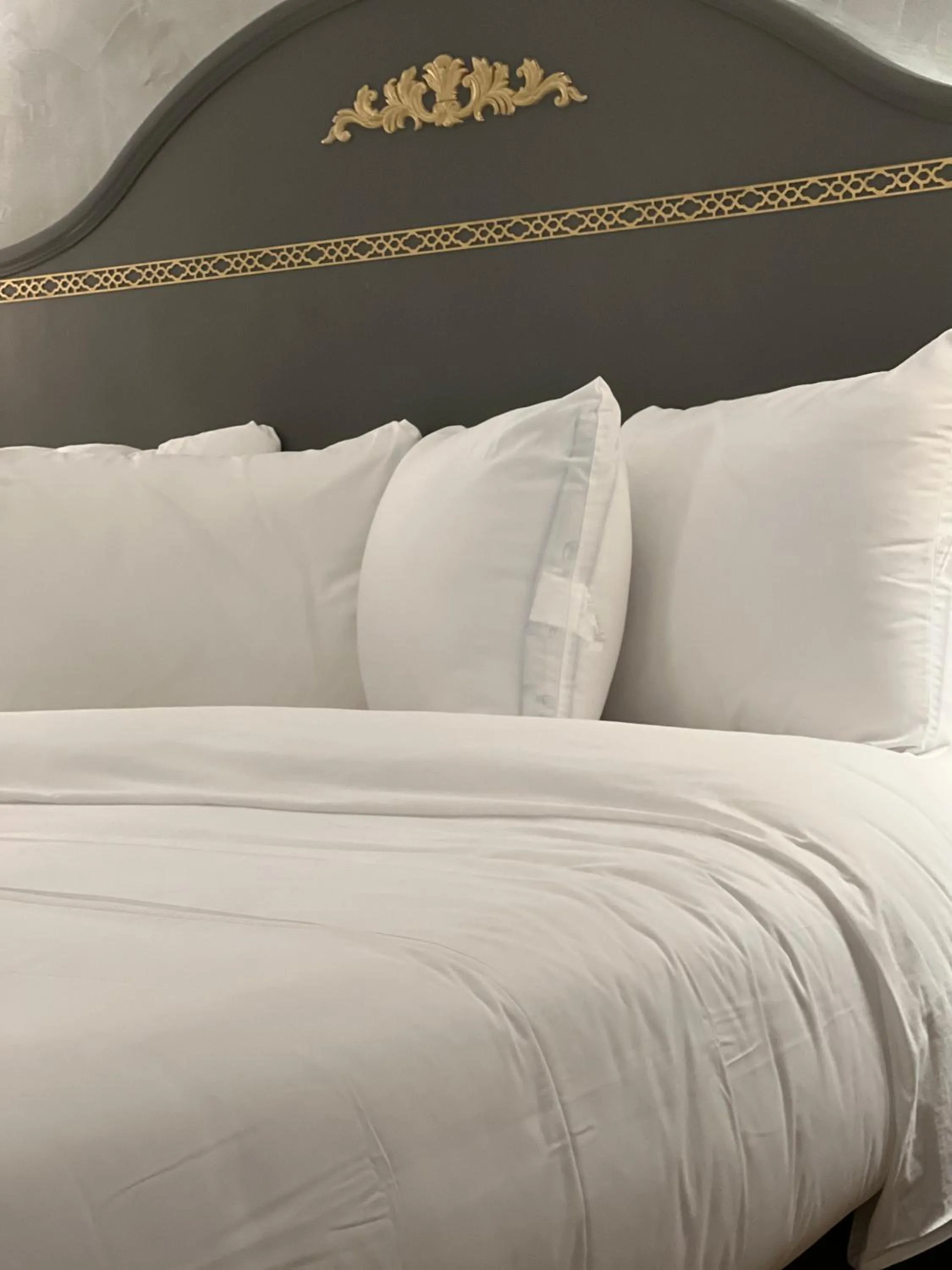 Bed in Chateau Suites