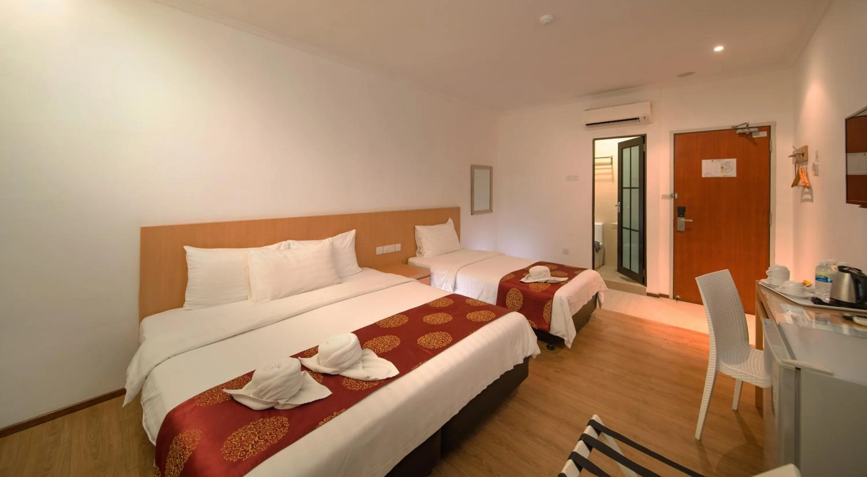 Photo of the whole room, Bed in 1 Million Hotel