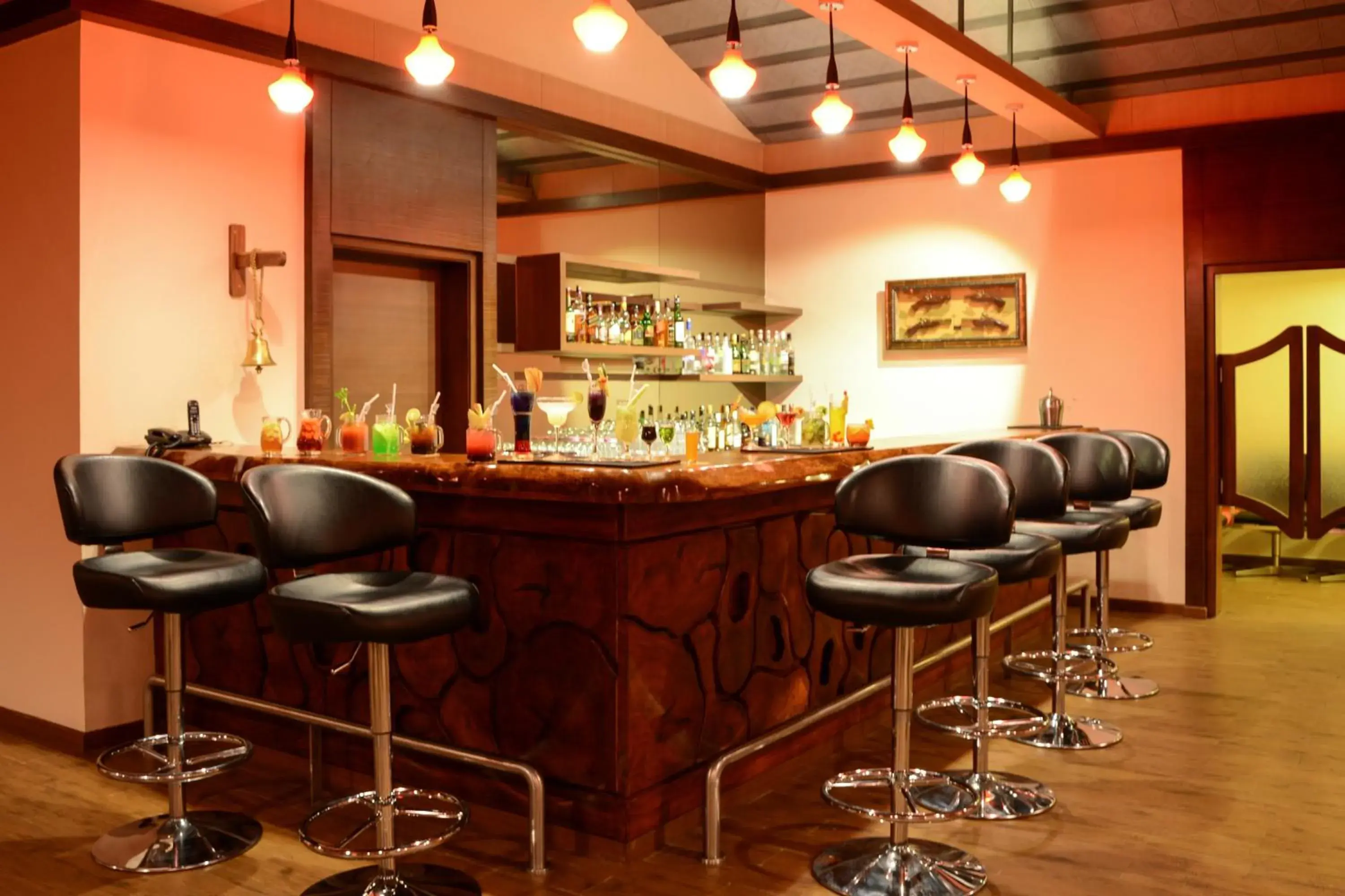 Lounge or bar in Purple Palms Resort & Spa Lounge or bar in Purple Palms Resort & Spa