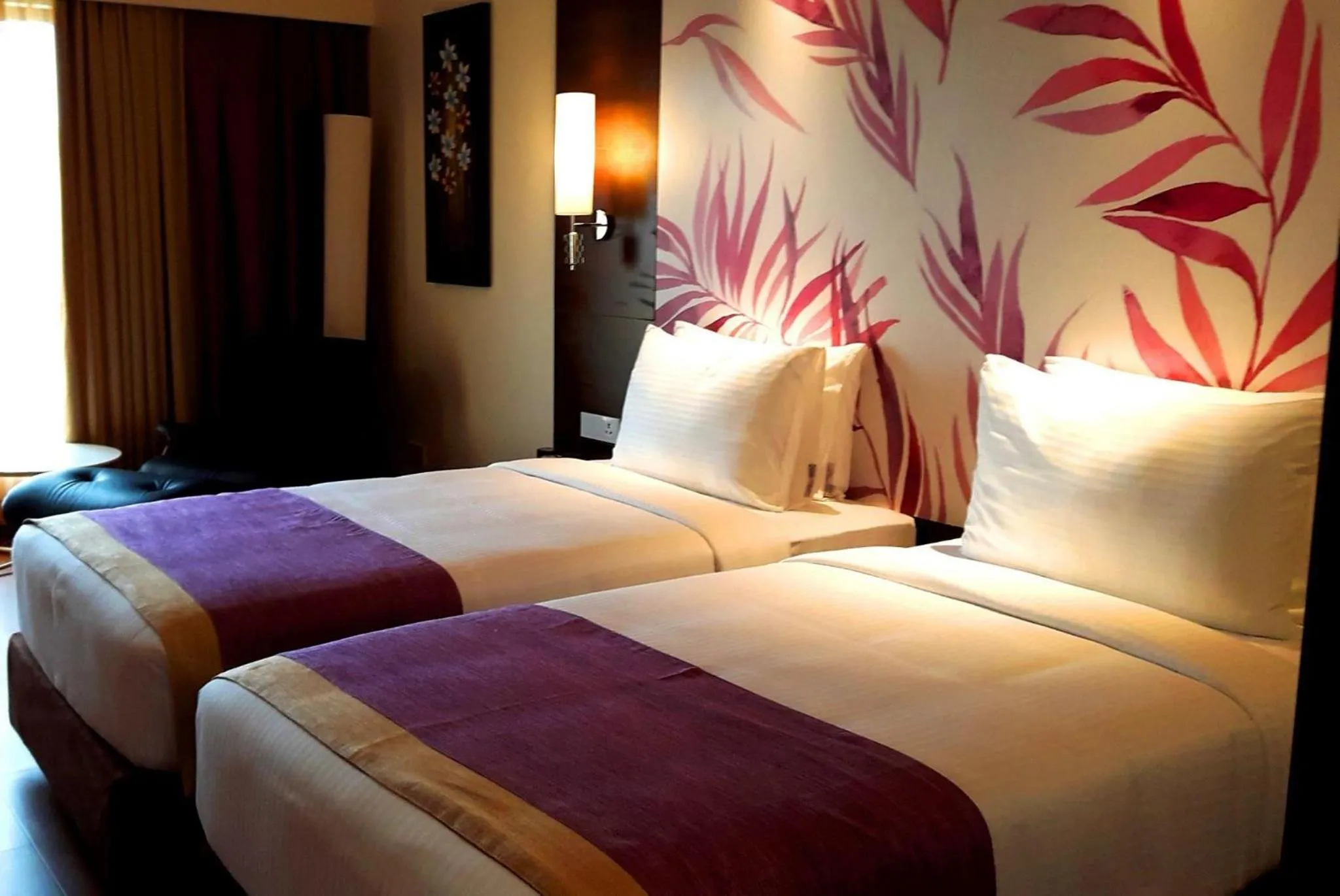 Bed in Purple Palms Resort & Spa