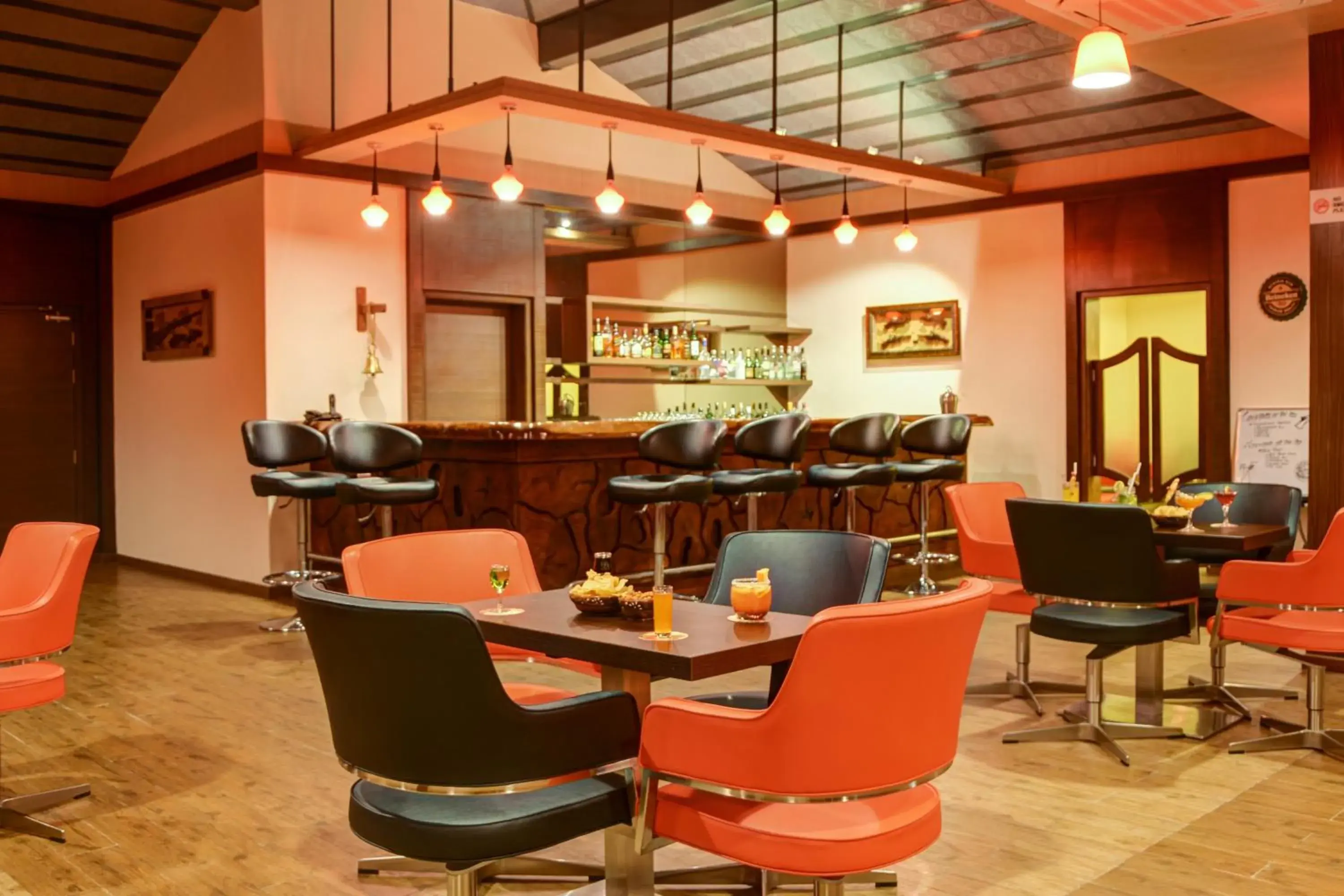 Lounge or bar in Purple Palms Resort & Spa Lounge or bar in Purple Palms Resort & Spa