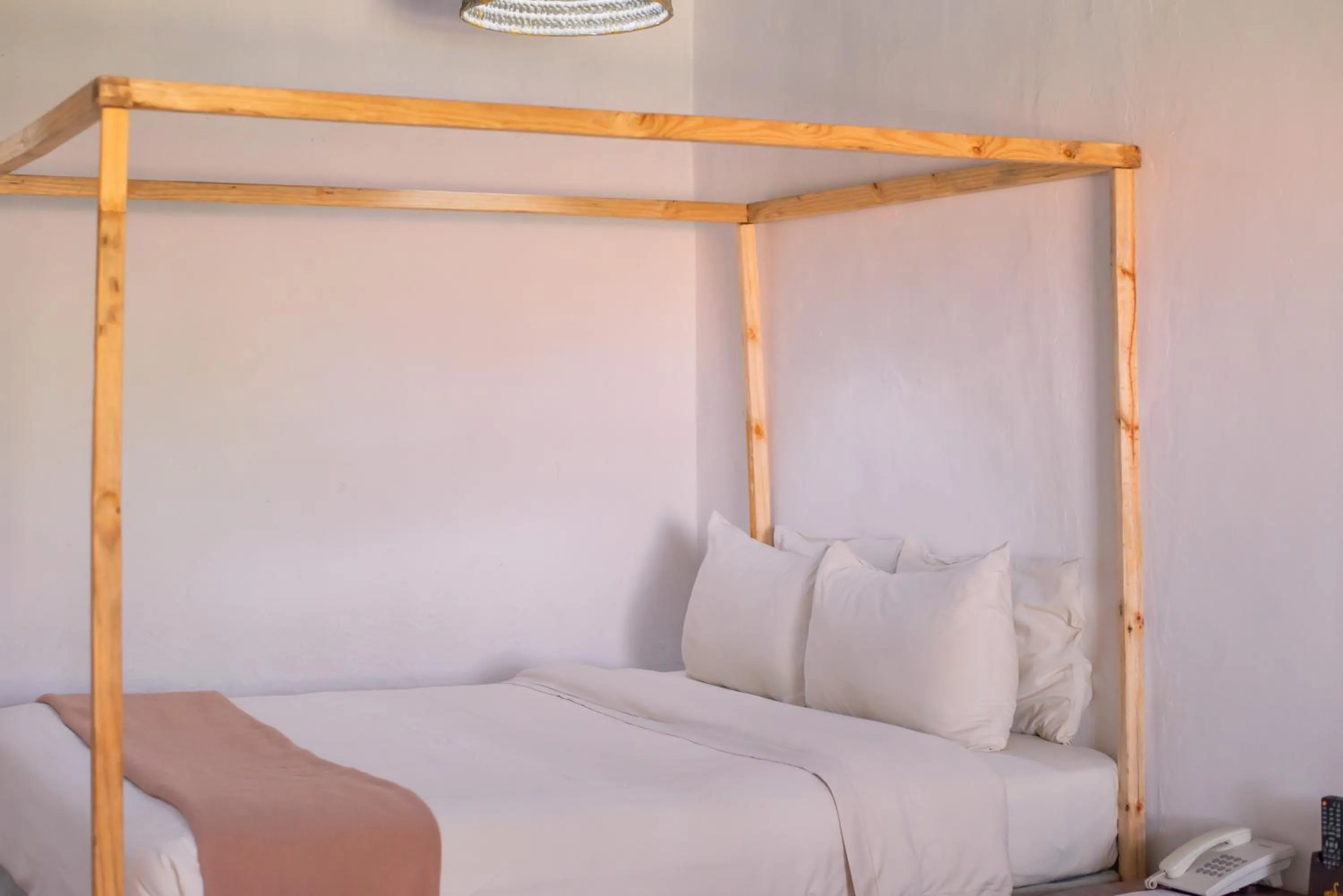 Bed in Blue Waters by Serendib