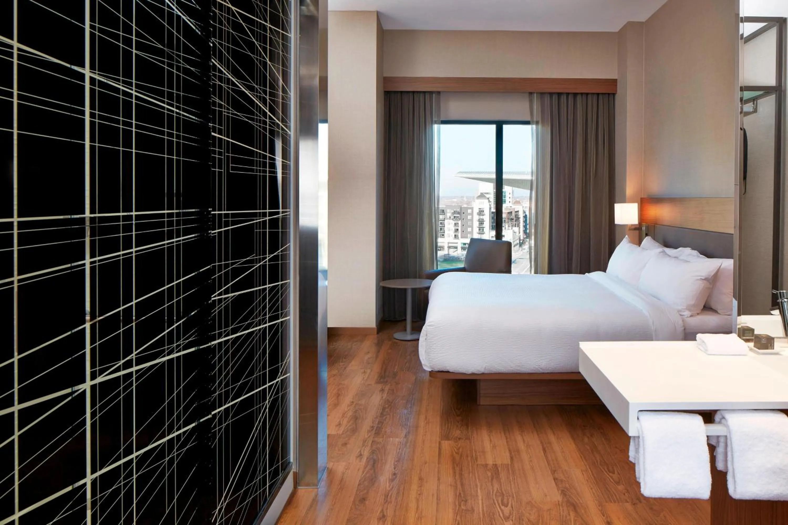 Photo of the whole room, Bed in AC Hotel by Marriott Minneapolis Downtown