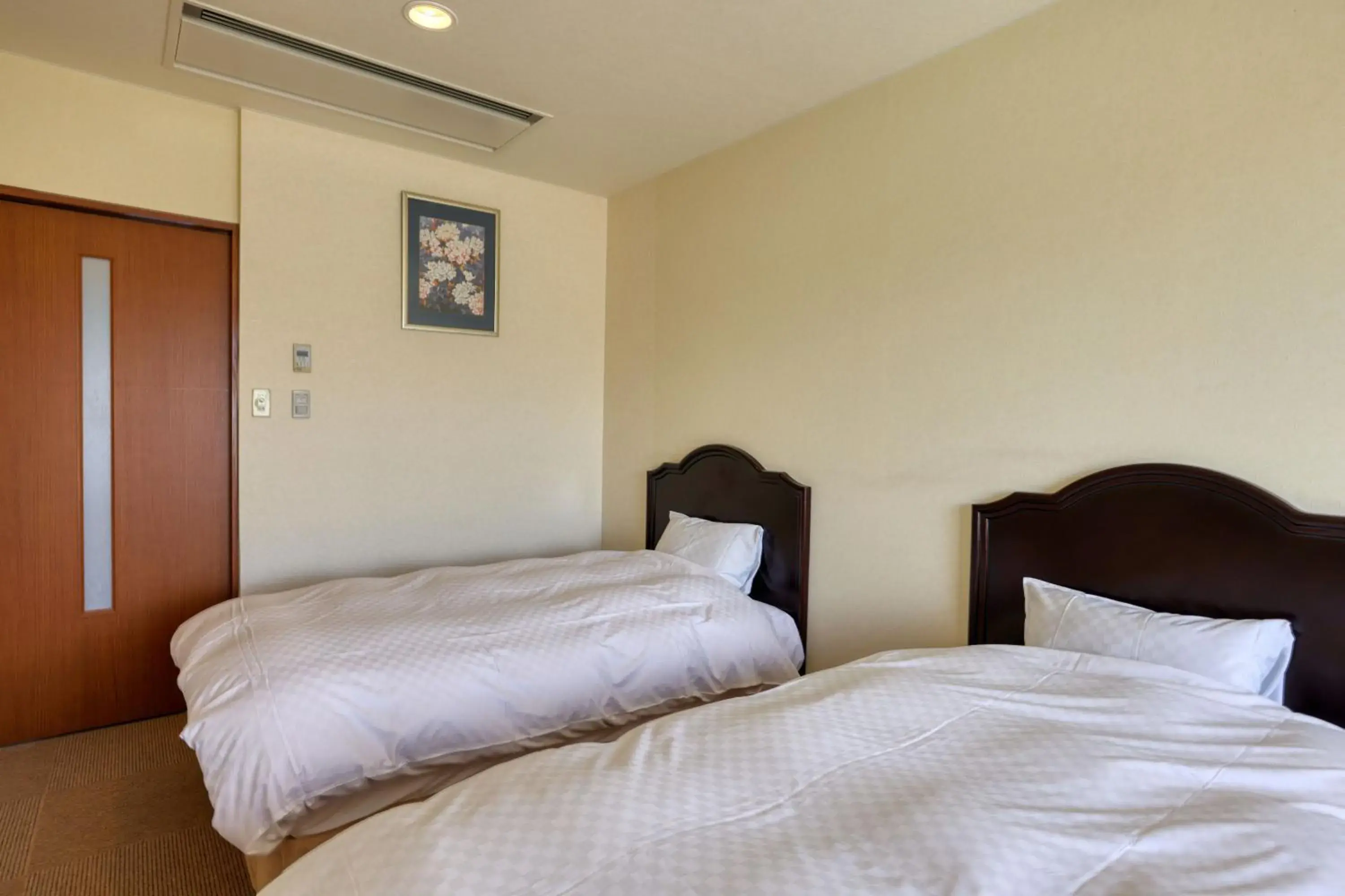 Bed in Fuji Matsuzono Hotel Bed in Fuji Matsuzono Hotel