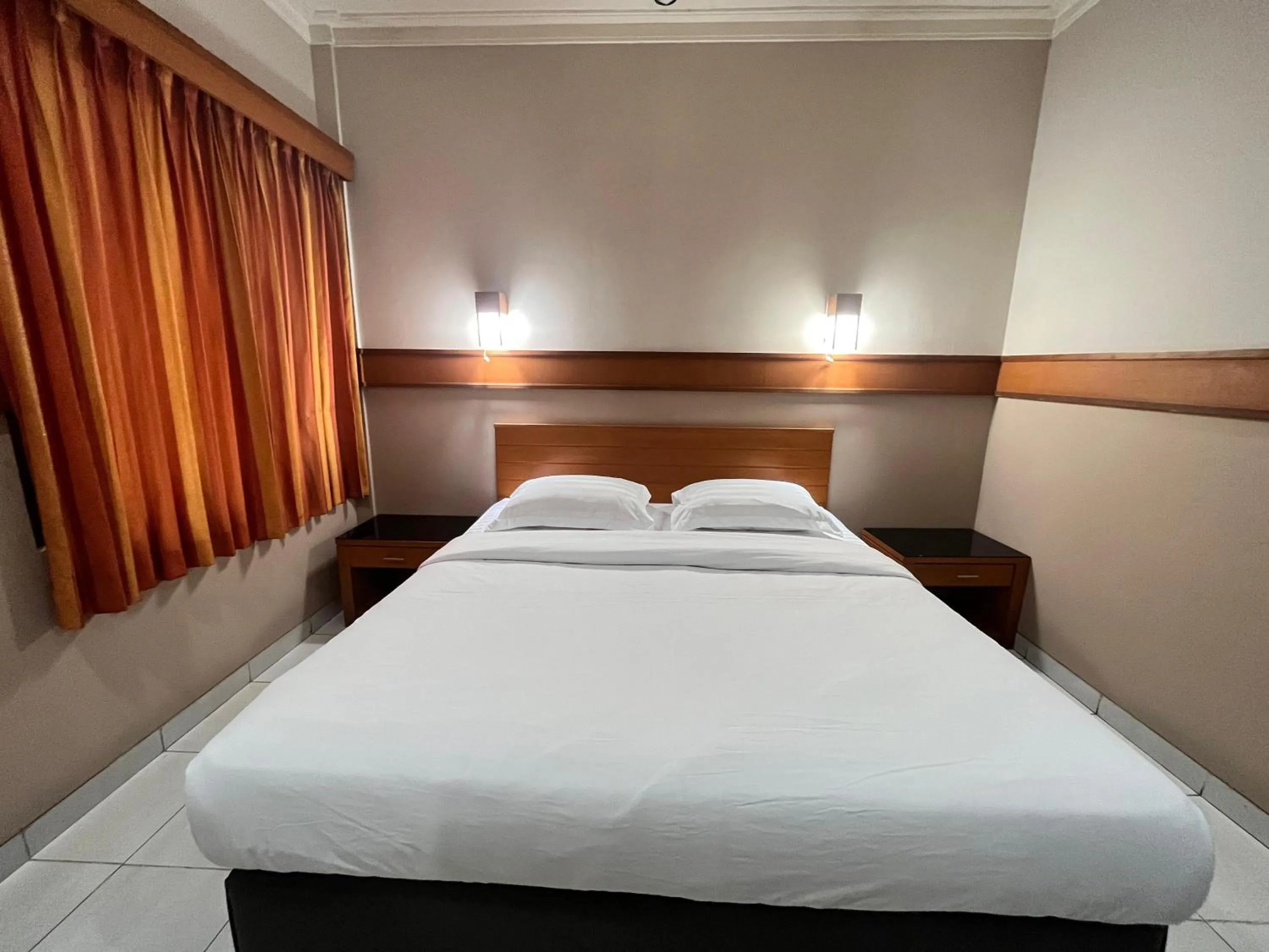 Bed in Hotel Caravan Tanah Abang