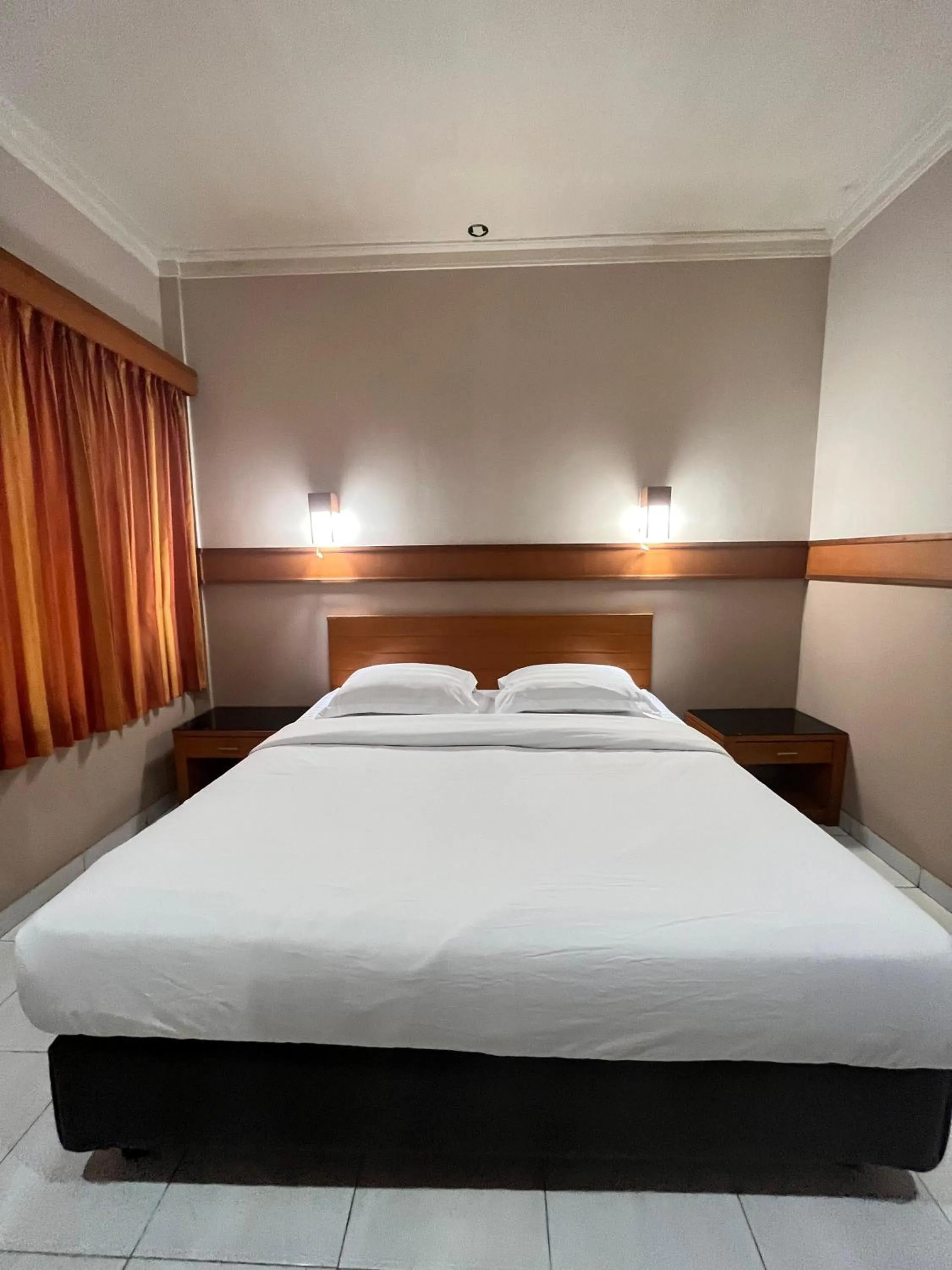 Bed in Hotel Caravan Tanah Abang