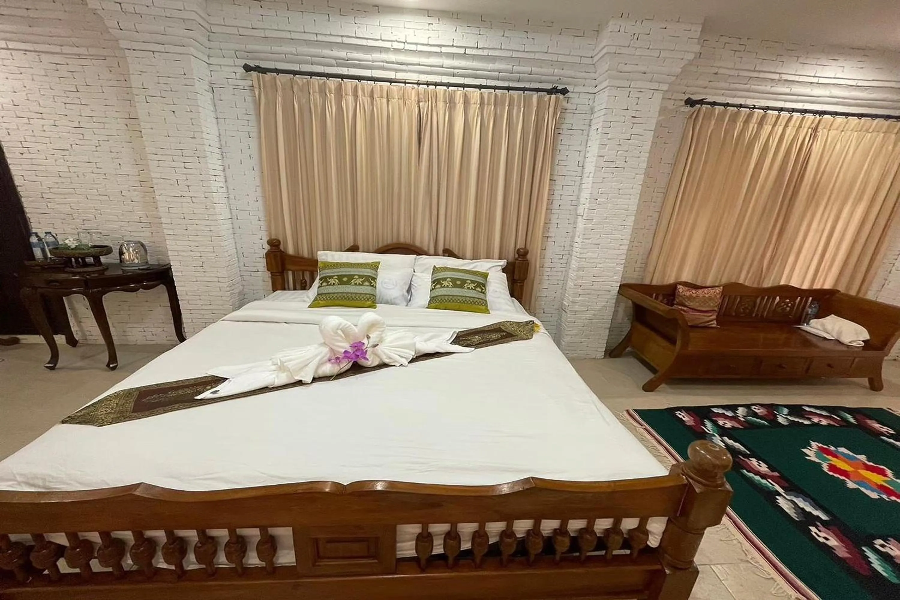 Bed in Baan Tawai Lanna Resort