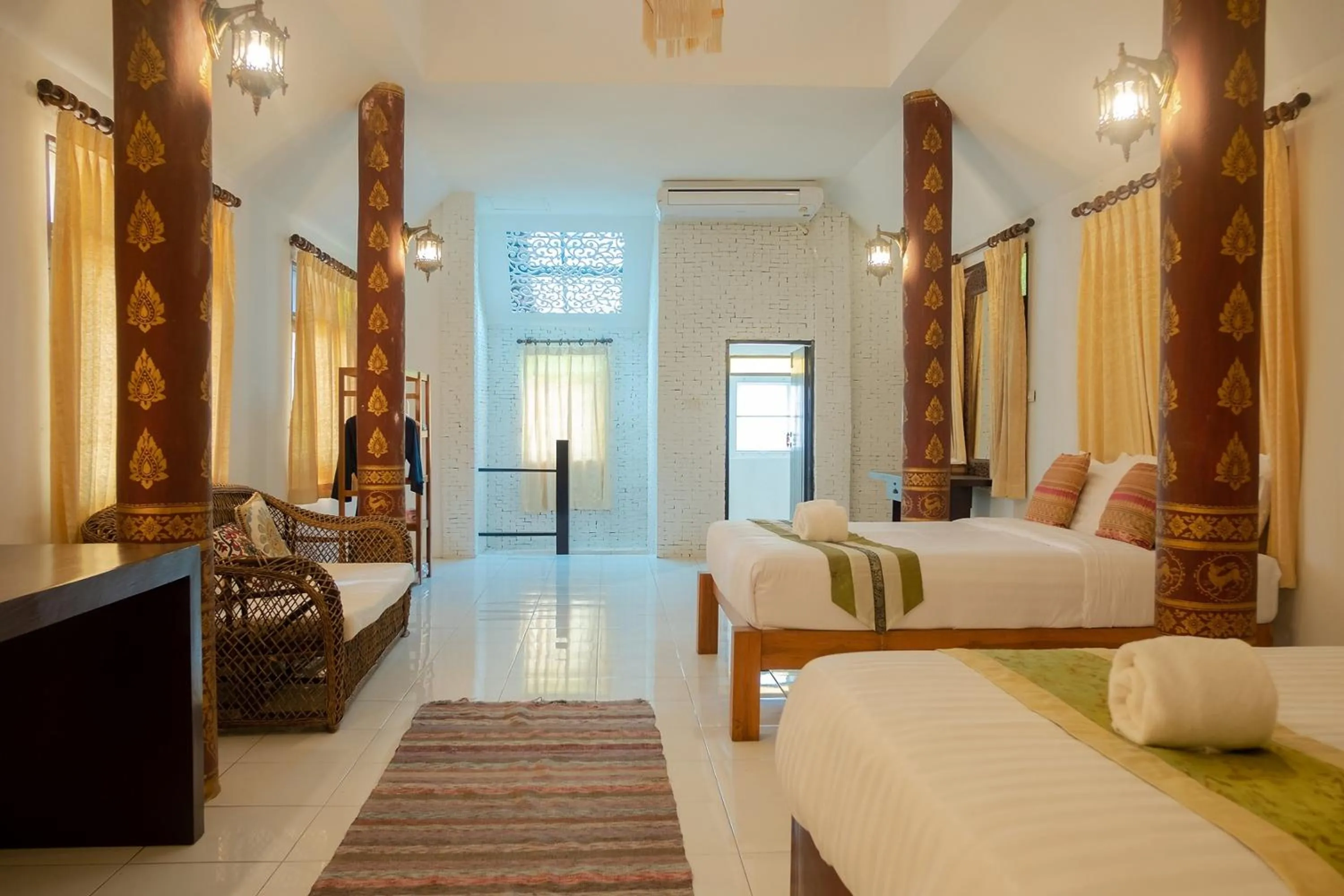 Bed in Baan Tawai Lanna Resort