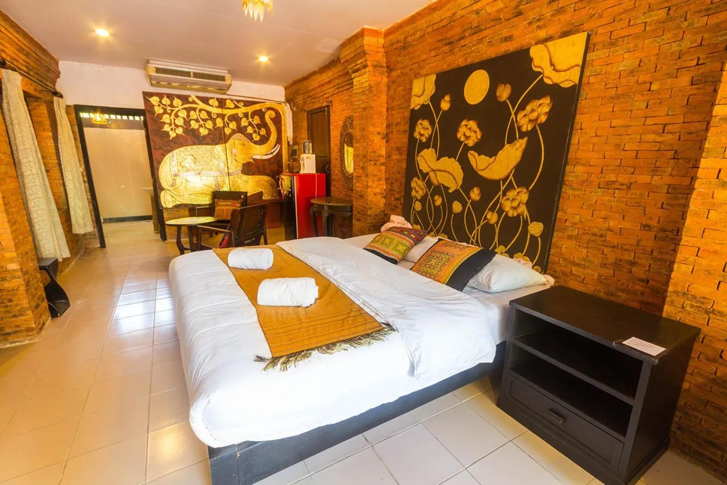 Bed in Baan Tawai Lanna Resort