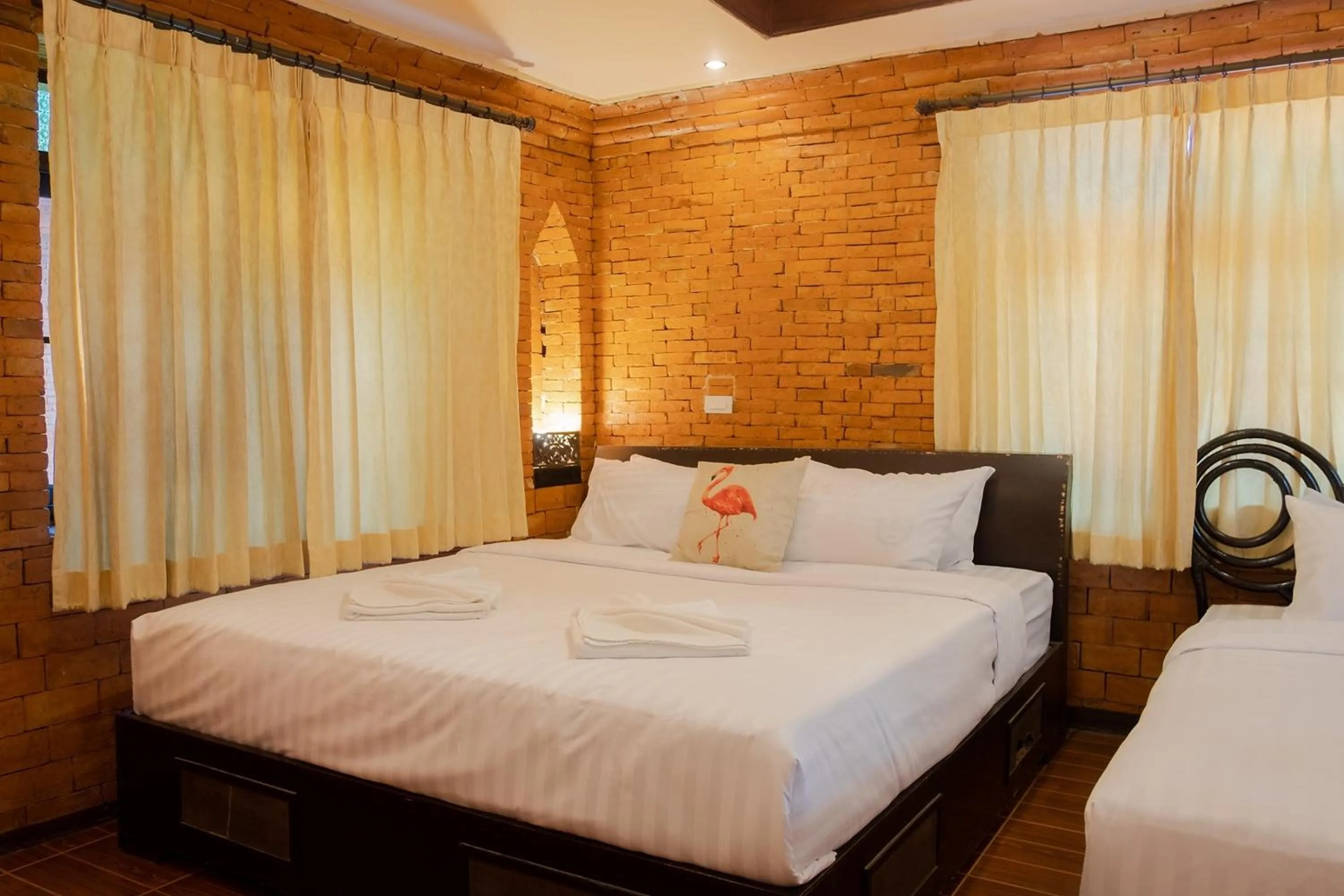 Bed in Baan Tawai Lanna Resort