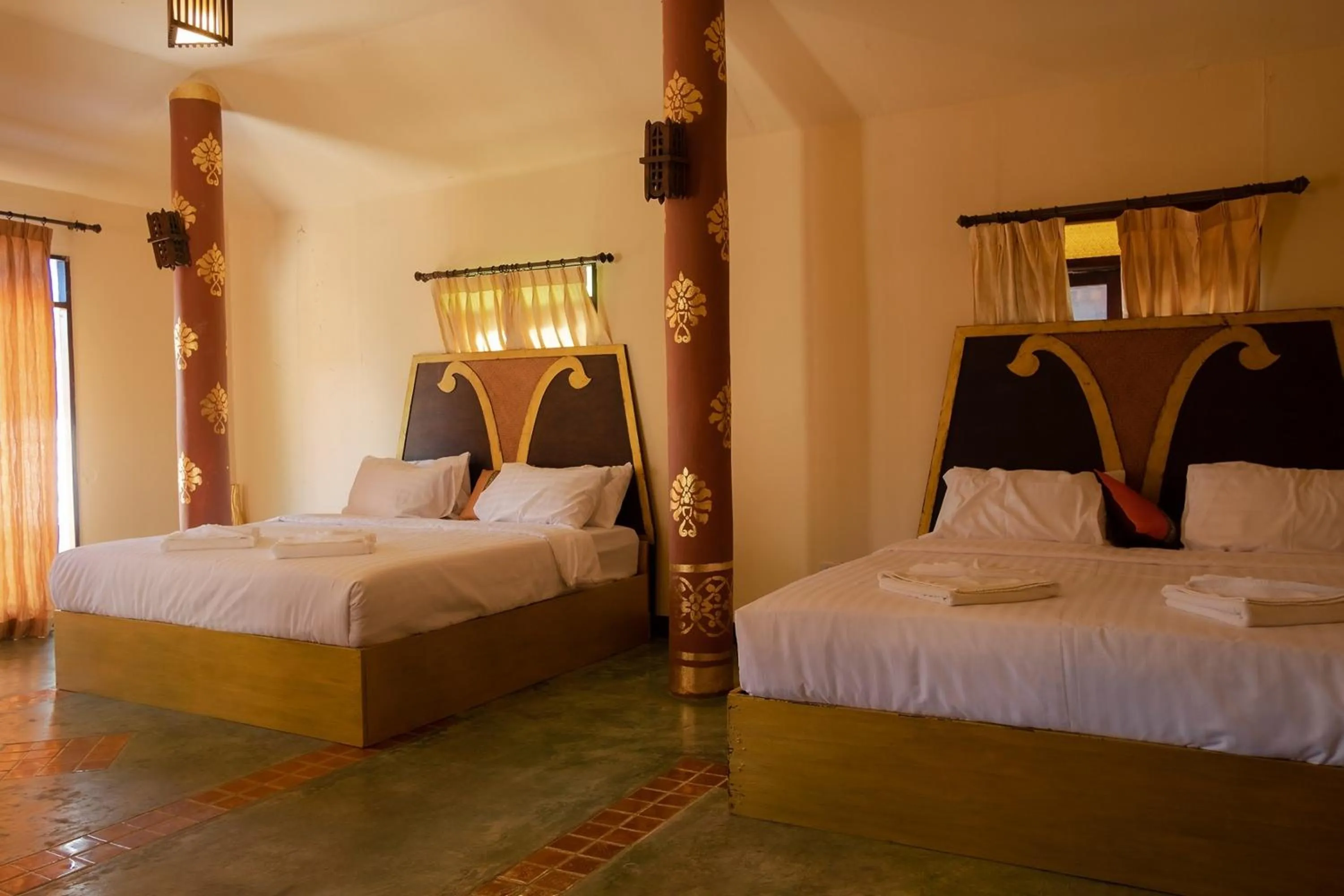 Bed in Baan Tawai Lanna Resort