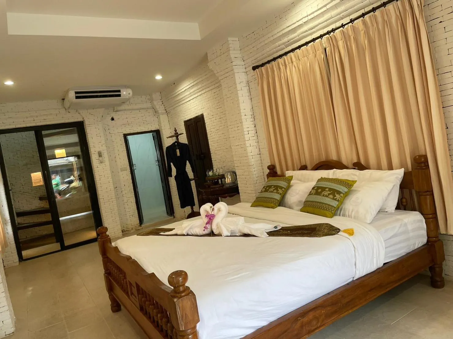 Bed in Baan Tawai Lanna Resort