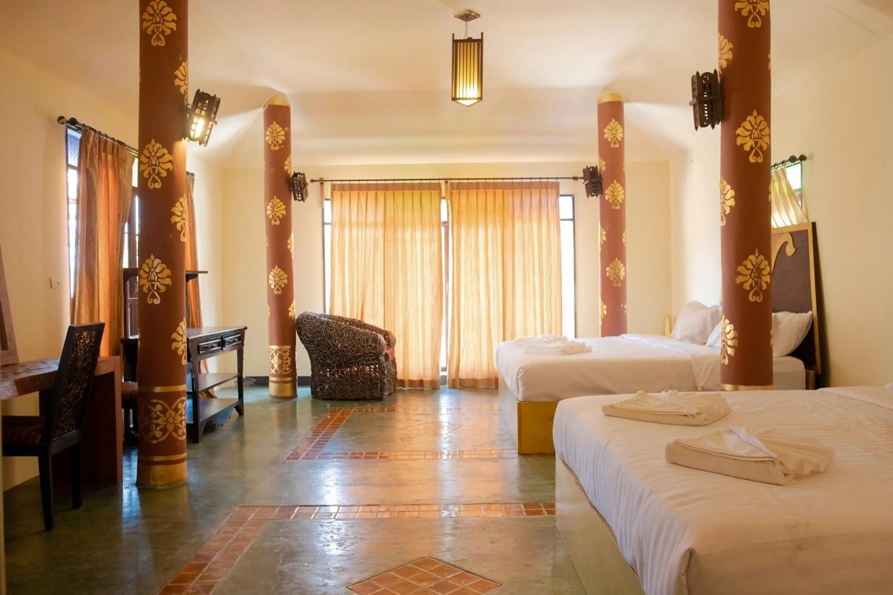 Bed in Baan Tawai Lanna Resort