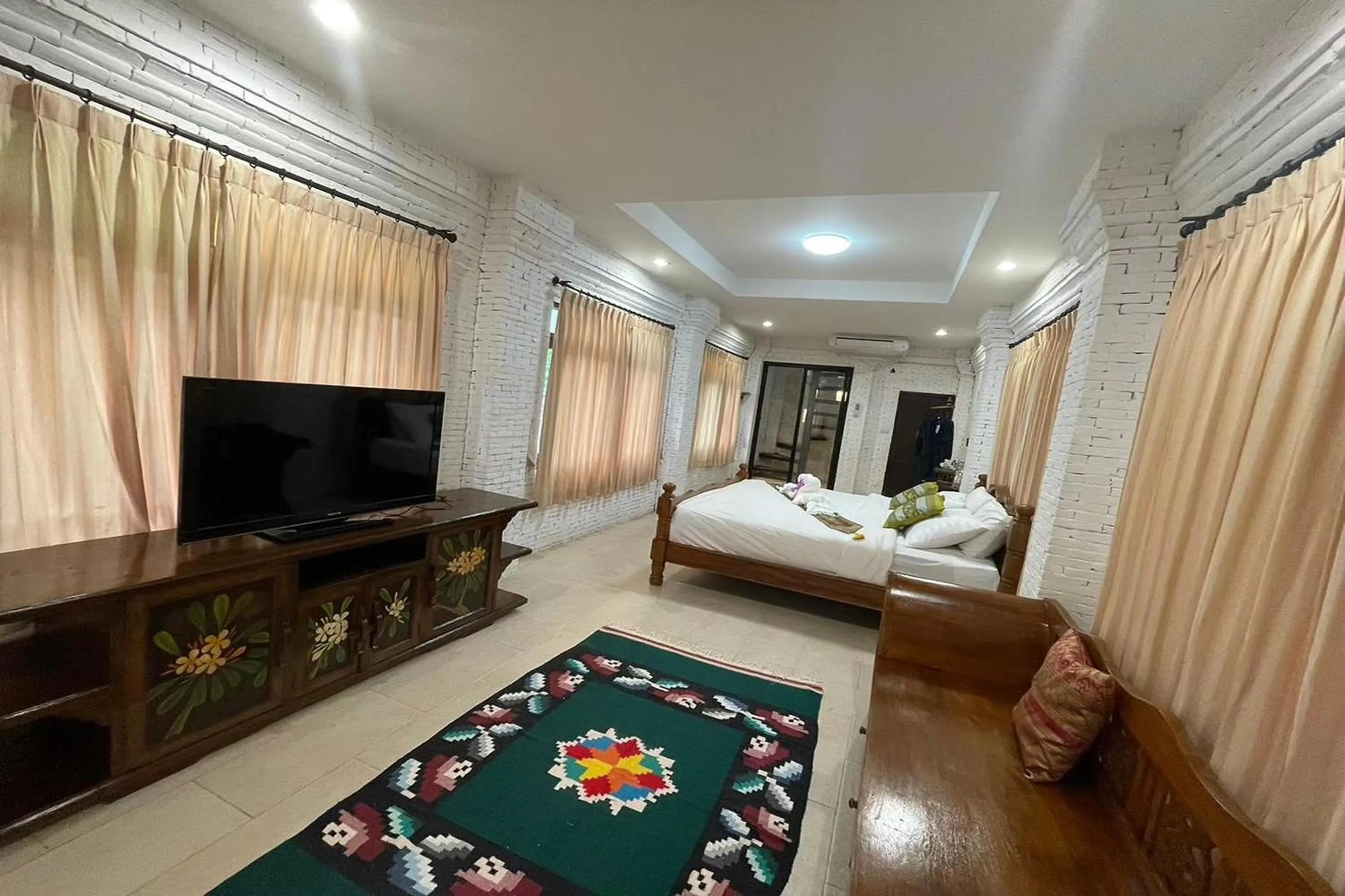 Bed in Baan Tawai Lanna Resort