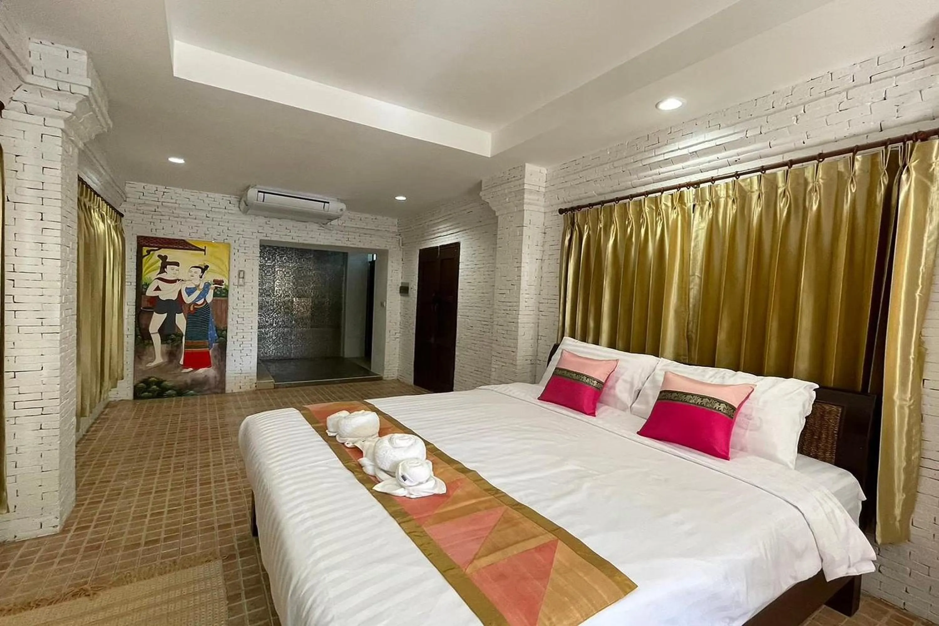 Bed in Baan Tawai Lanna Resort