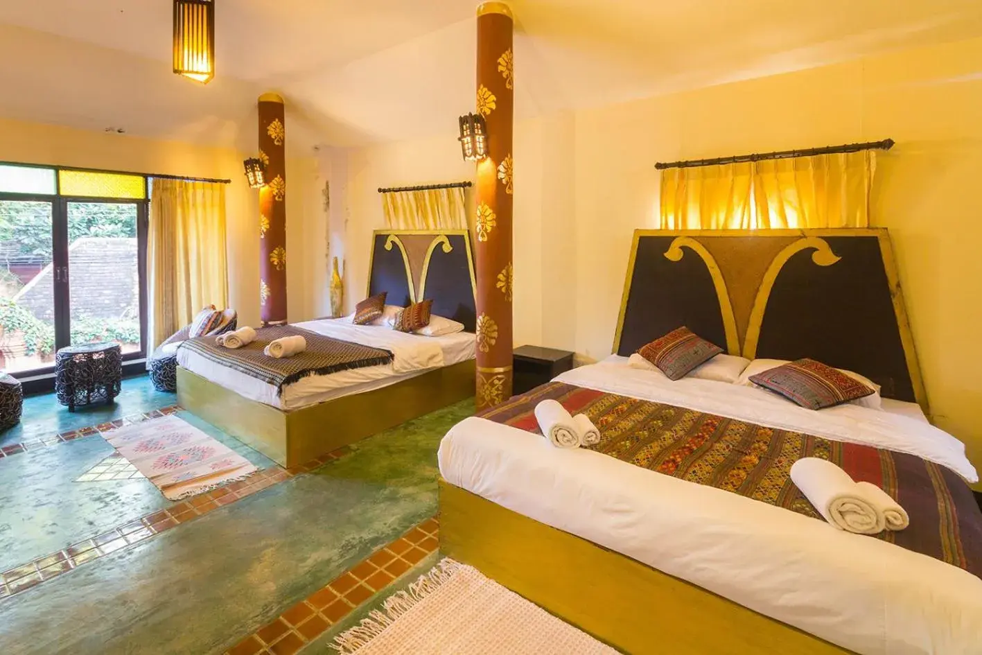 Bed in Baan Tawai Lanna Resort Bed in Baan Tawai Lanna Resort