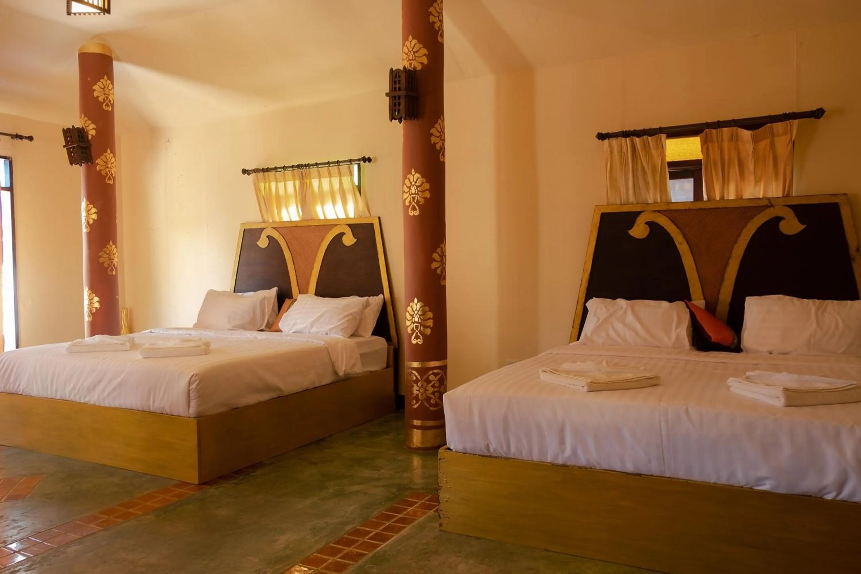 Bed in Baan Tawai Lanna Resort