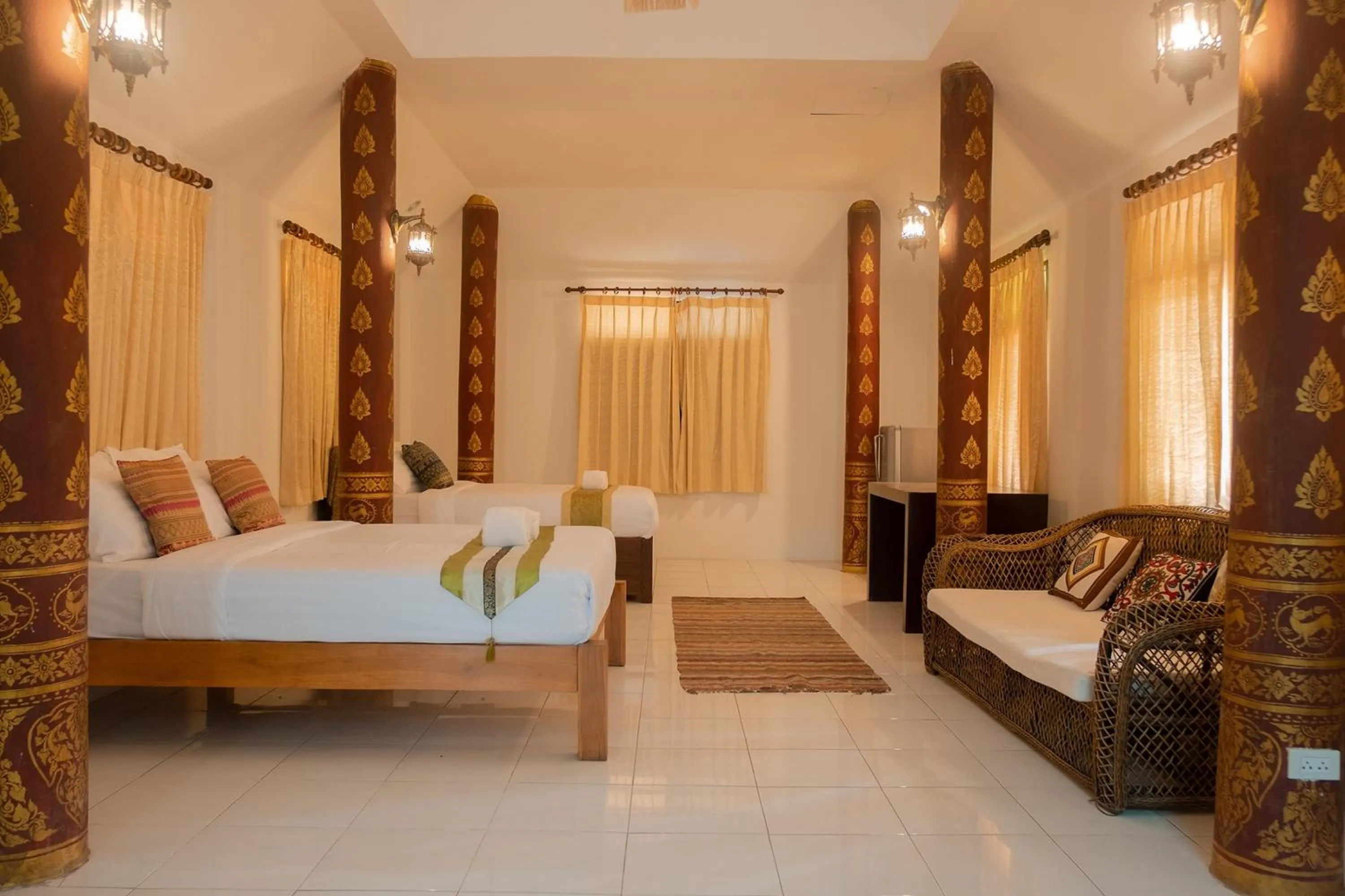 Bed in Baan Tawai Lanna Resort