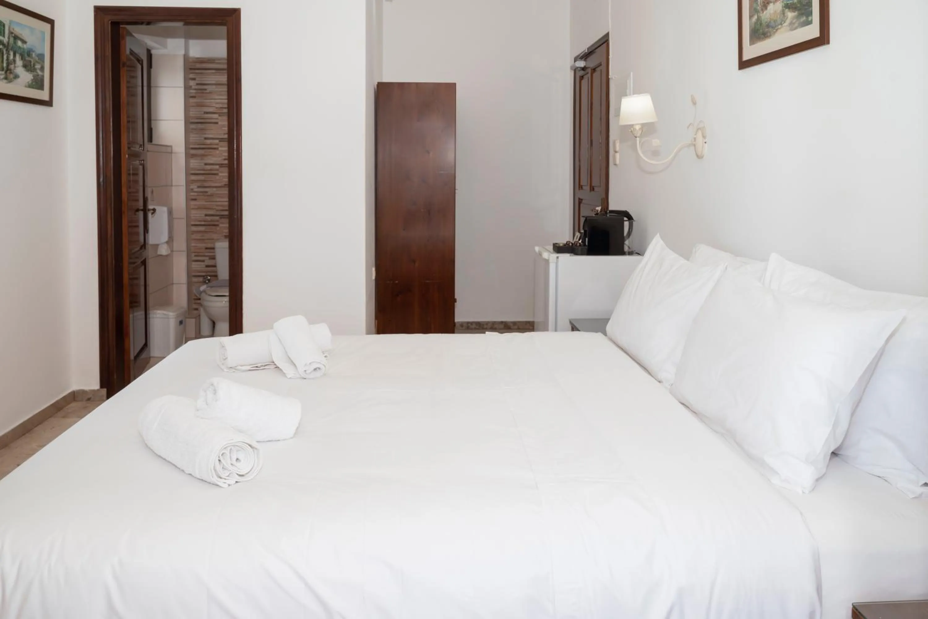 Bed in Argo Rooms-Papadakis