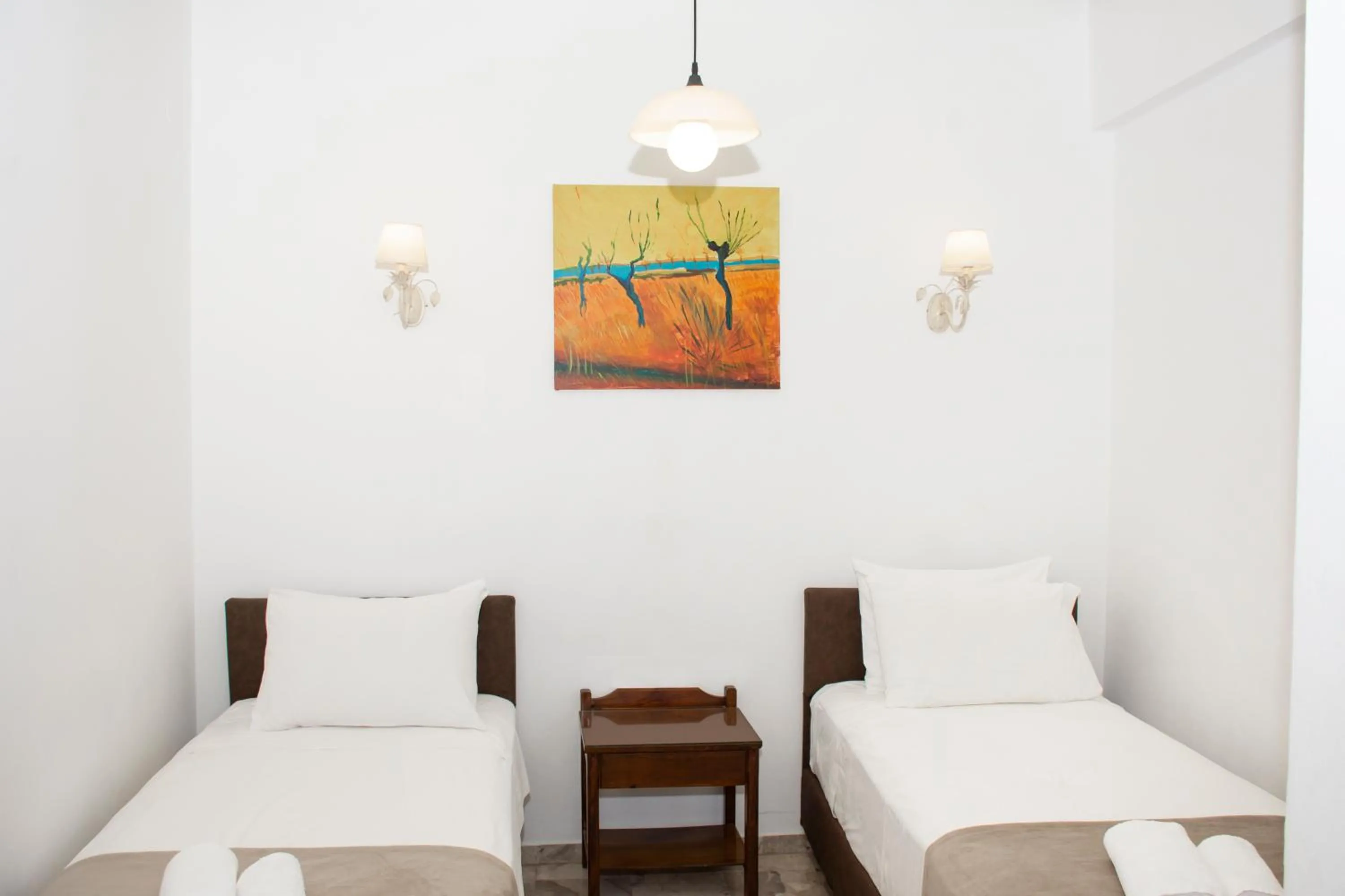 Bed in Argo Rooms-Papadakis