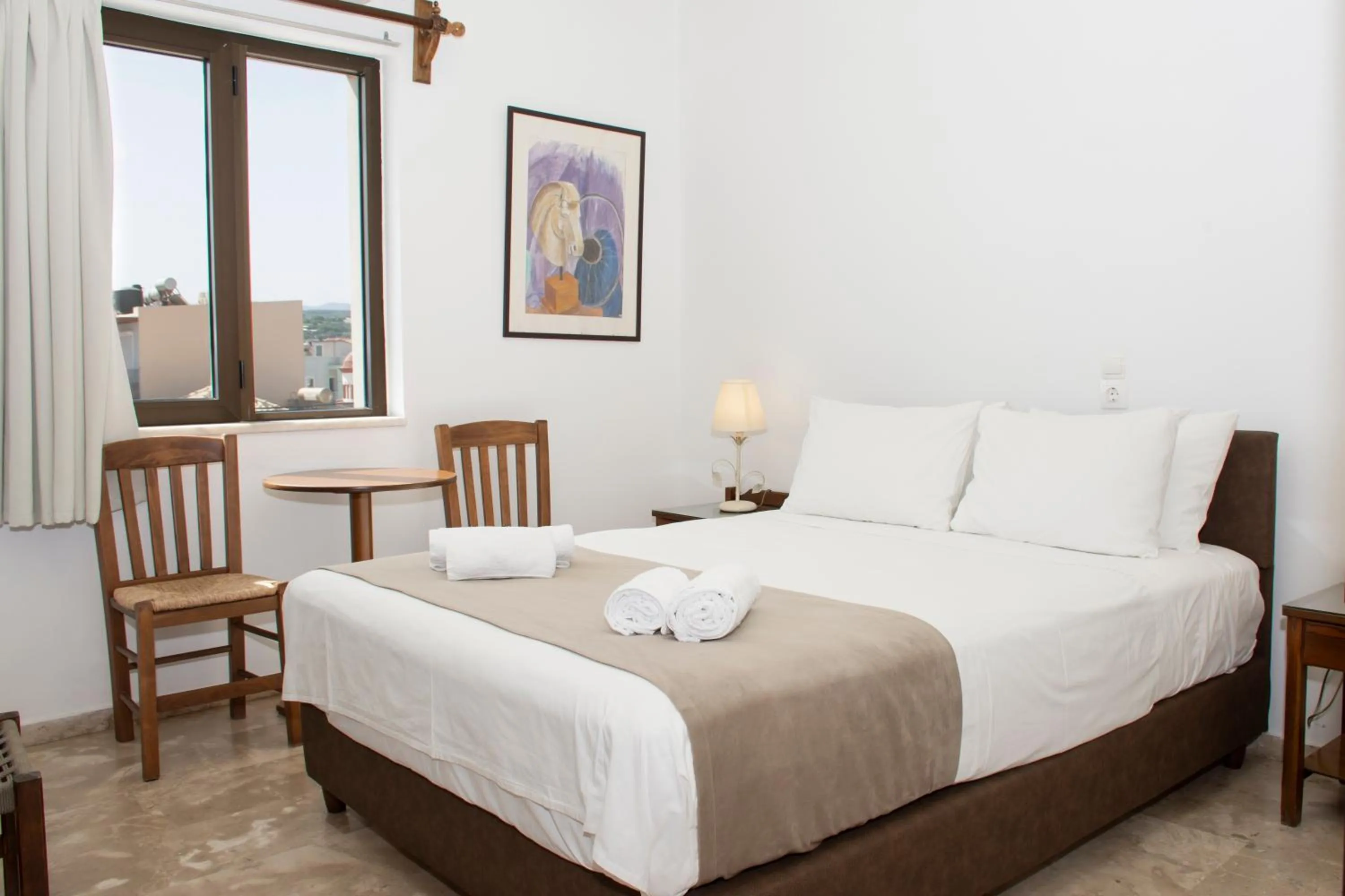 Bed in Argo Rooms-Papadakis