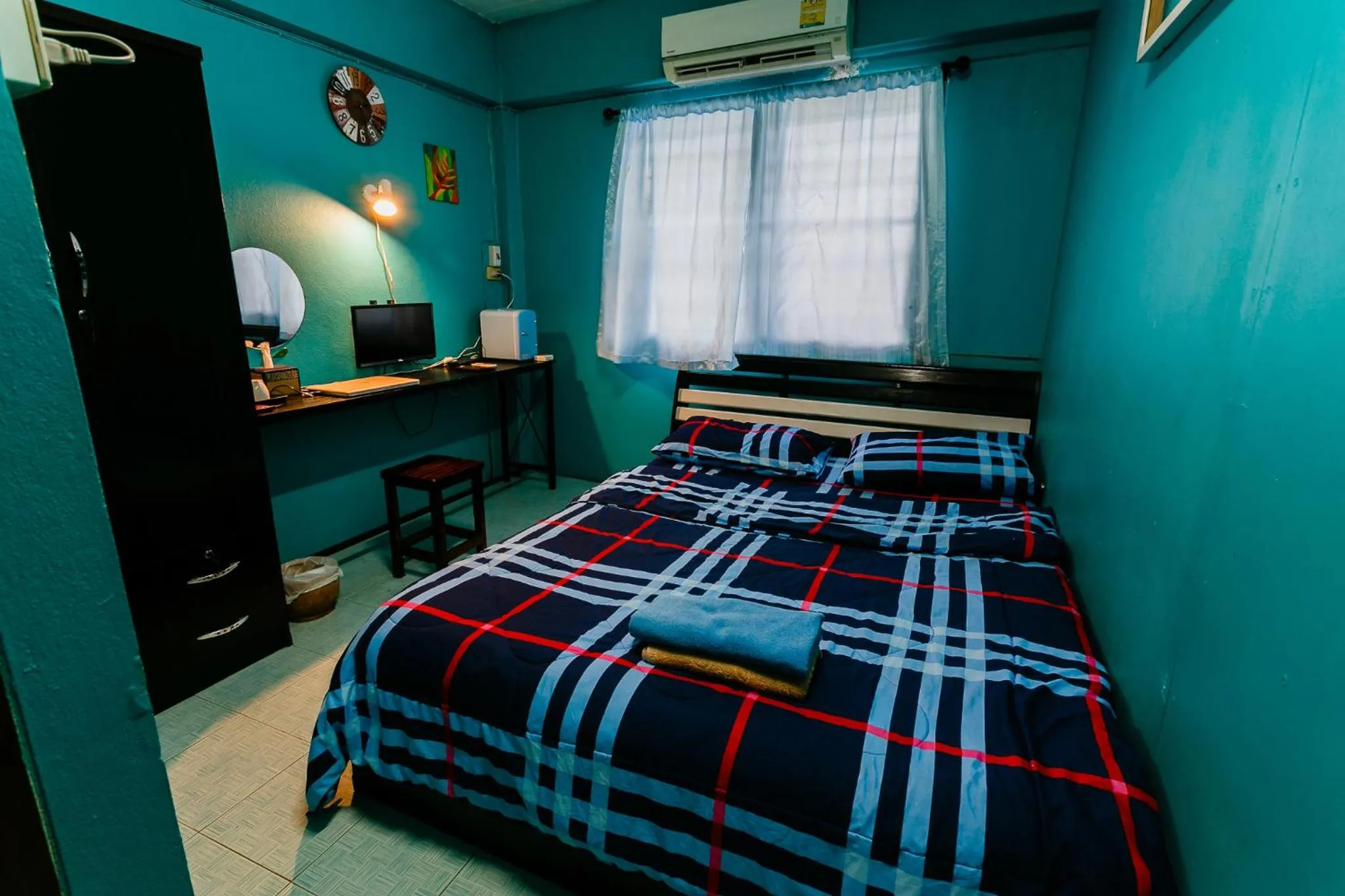 Photo of the whole room, Bed in Malai Place Lampang