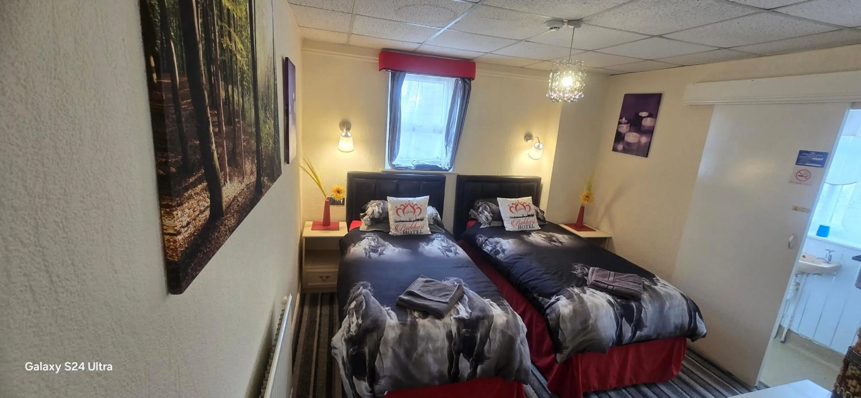 Bed in BUKHARI Hotel