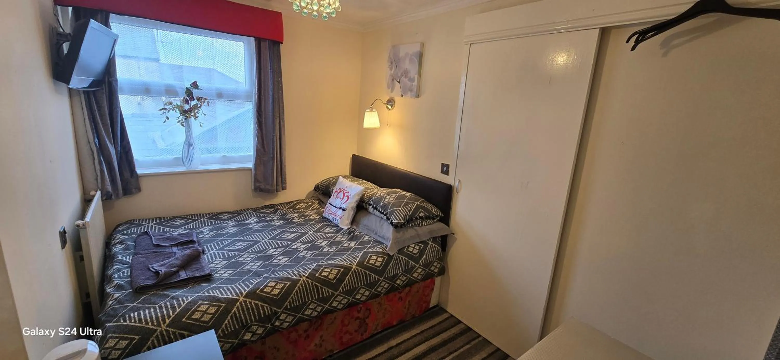 Bed in BUKHARI Hotel