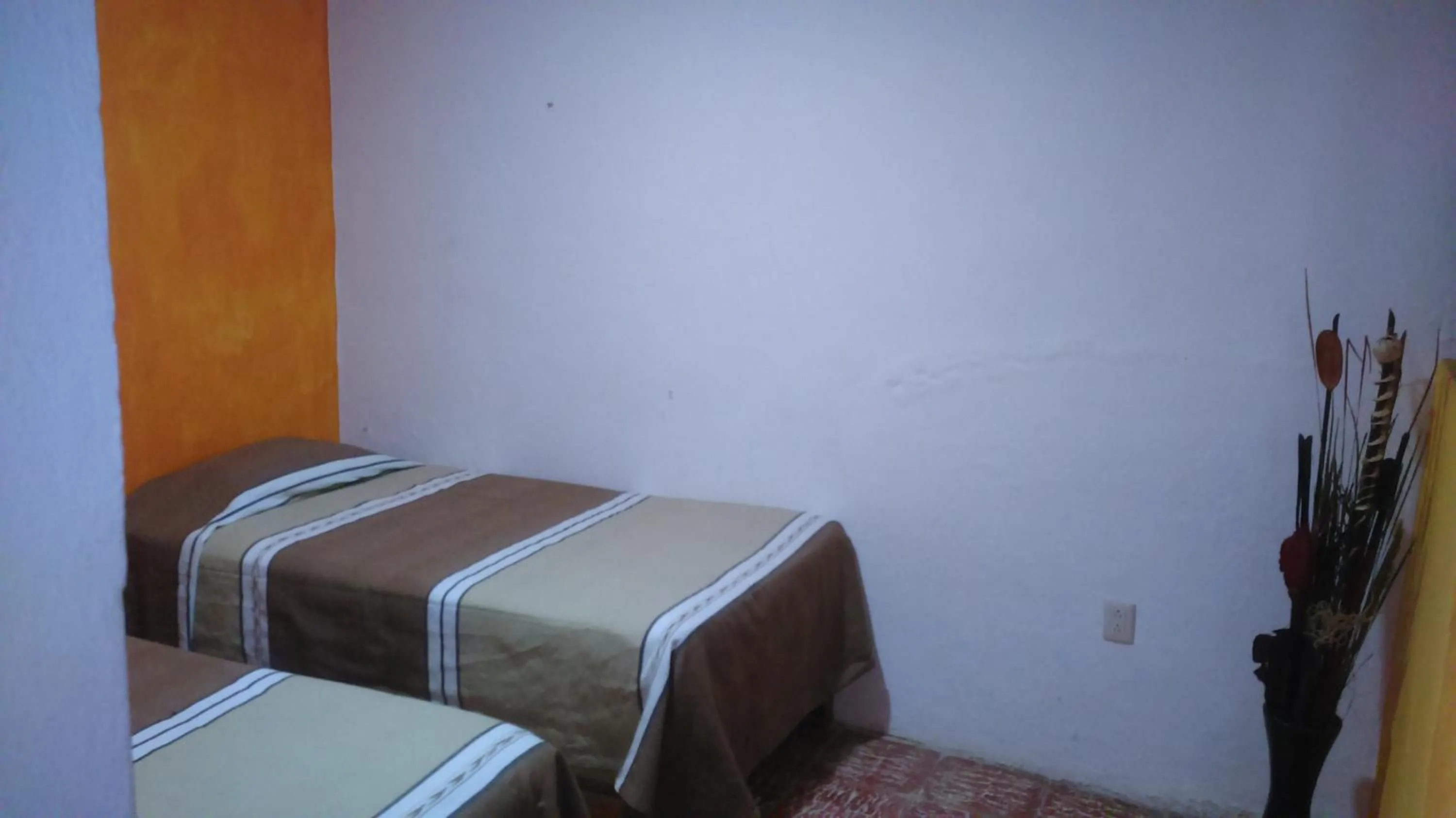 Bed in Hotel Hacienda Morales.