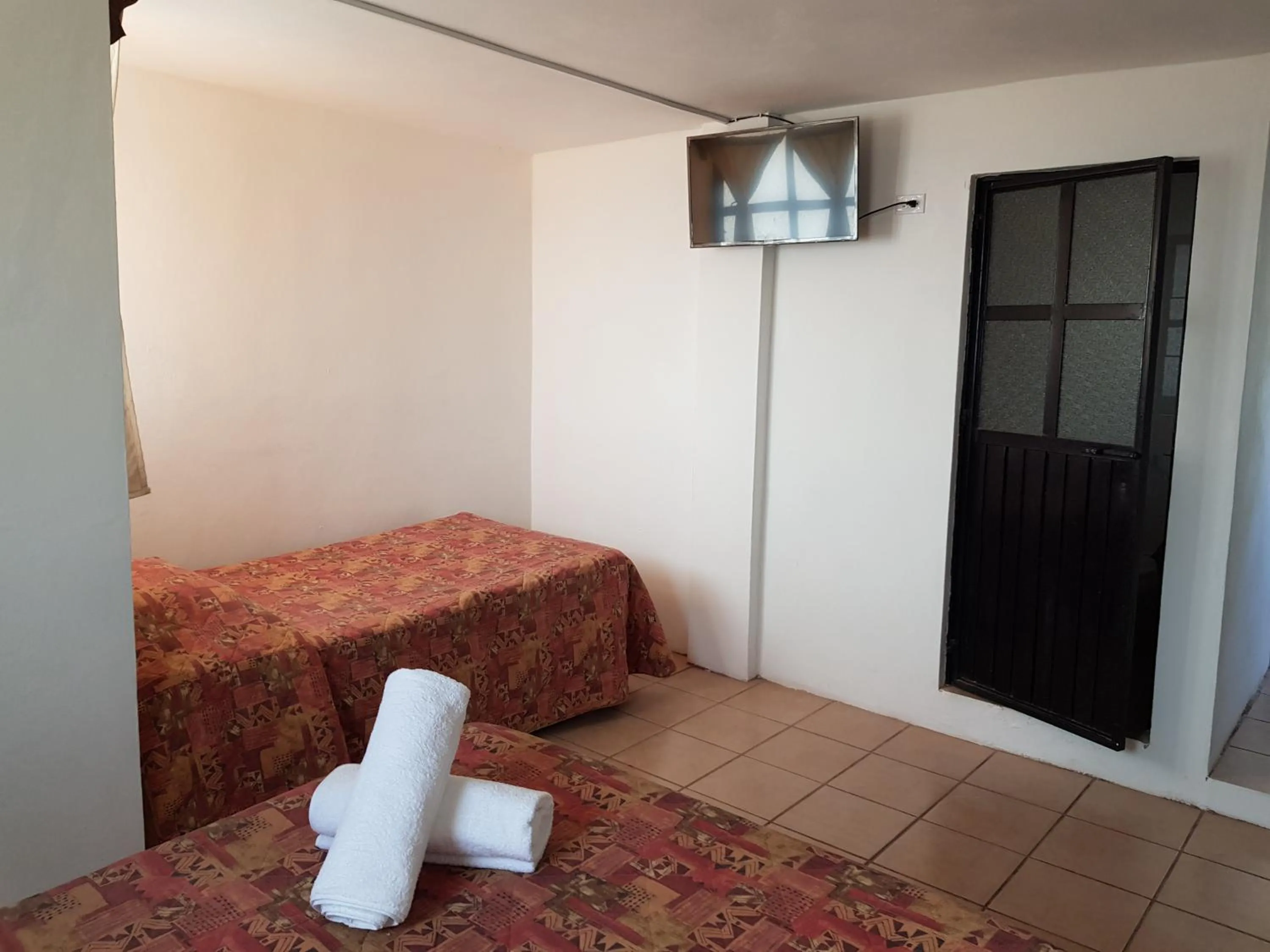 Bed in Hotel Hacienda Morales.